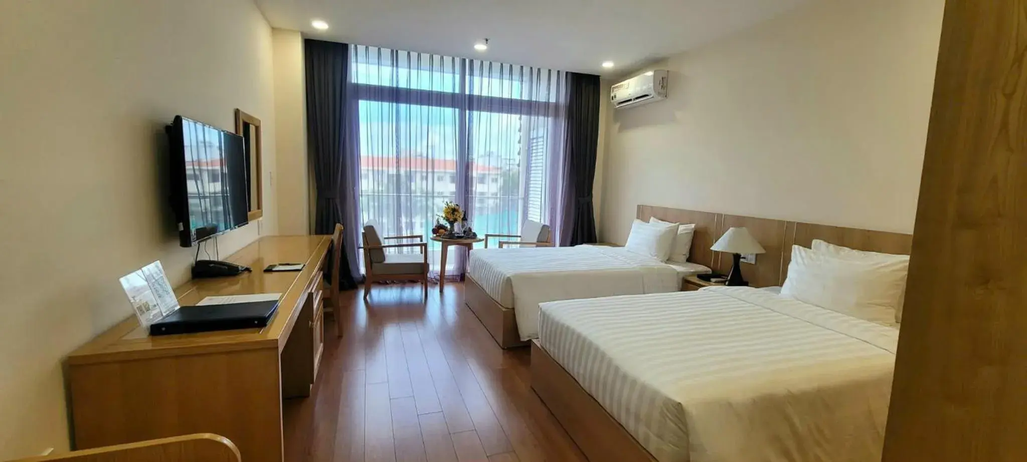 Bed in Sunflower Hotel & International Village Bed in Sunflower Hotel & International Village