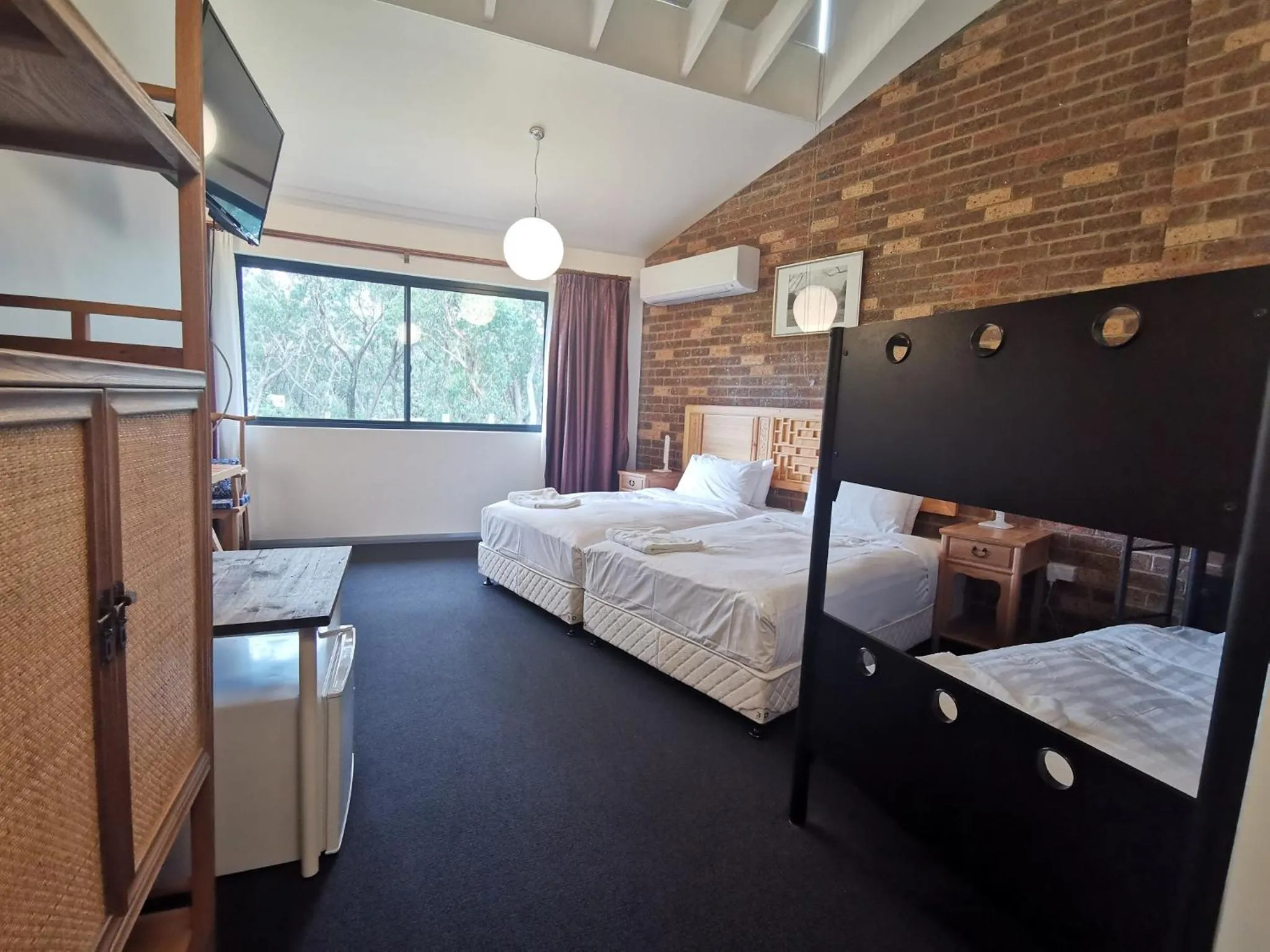 Bed in Sinofield Edu-Retreat