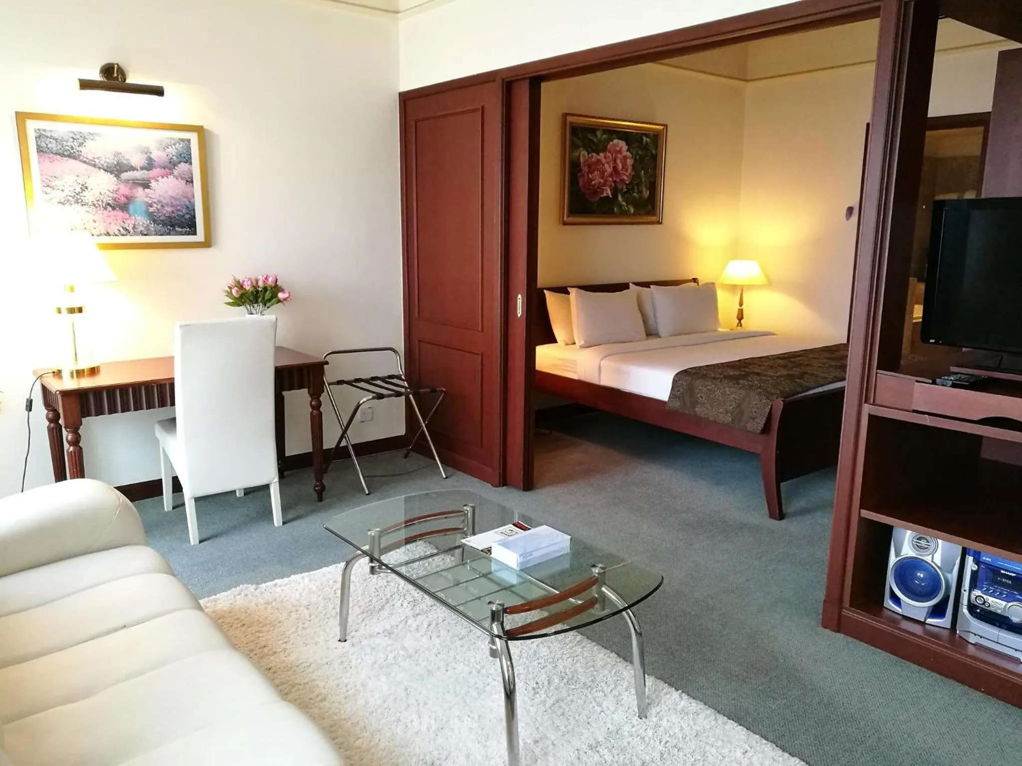 Living room, Bed in Times Service Suites @ Times Square