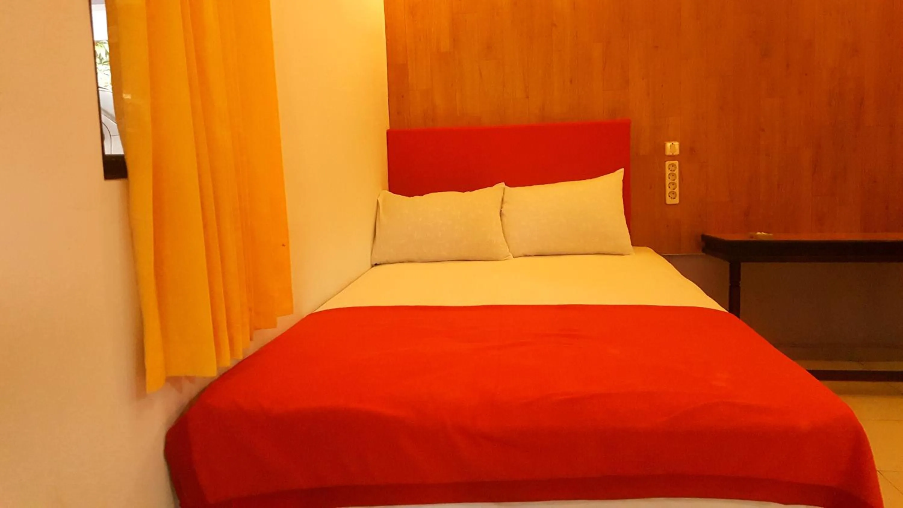 Bed in HOTEL SEGARA MANDALA