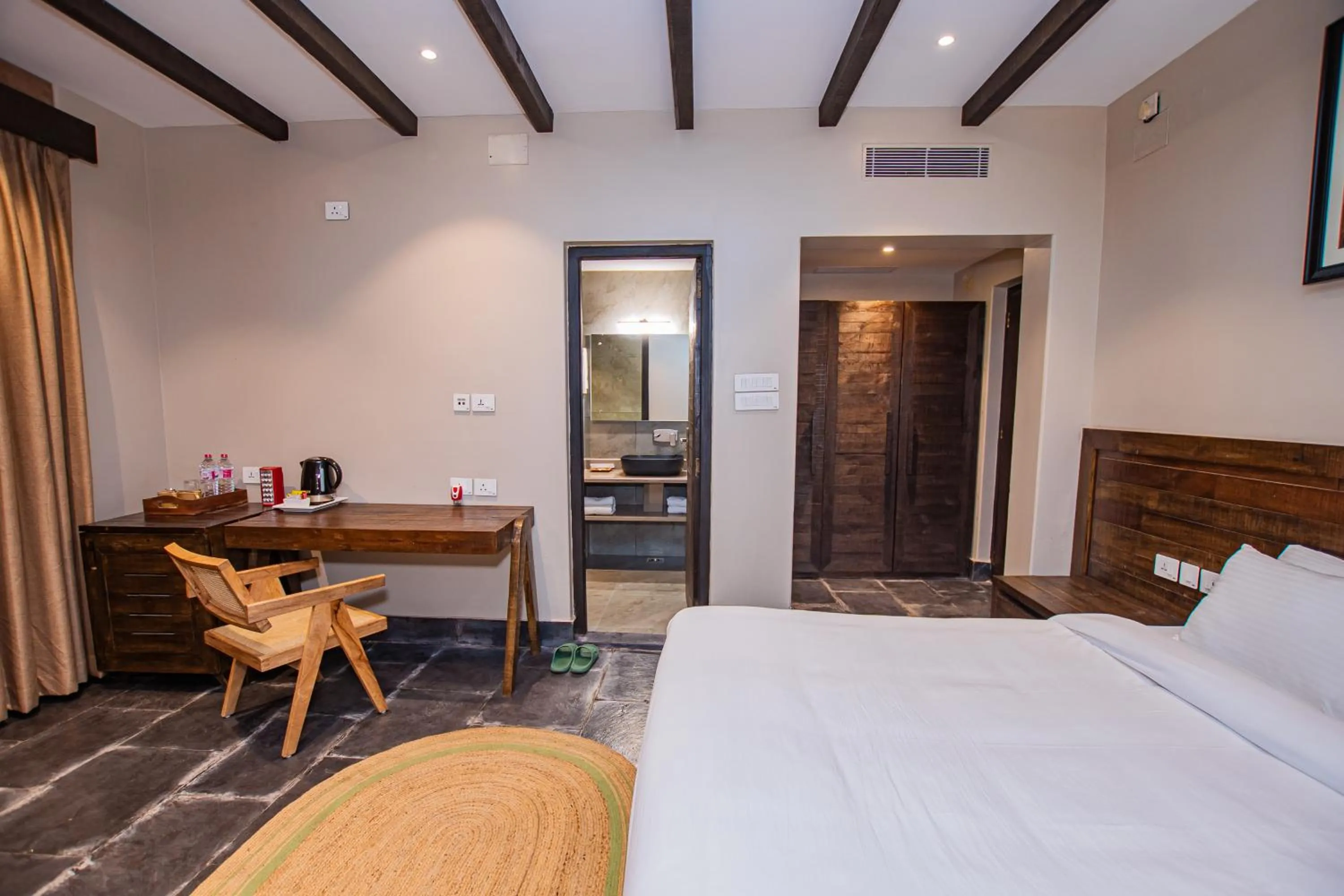 Photo of the whole room, Bed in Raniban Retreat