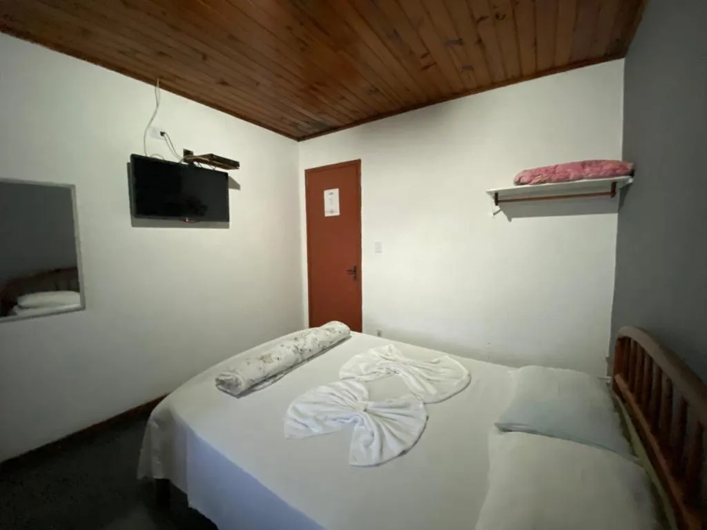 Bed in Pousada Trevo Do Barbuda