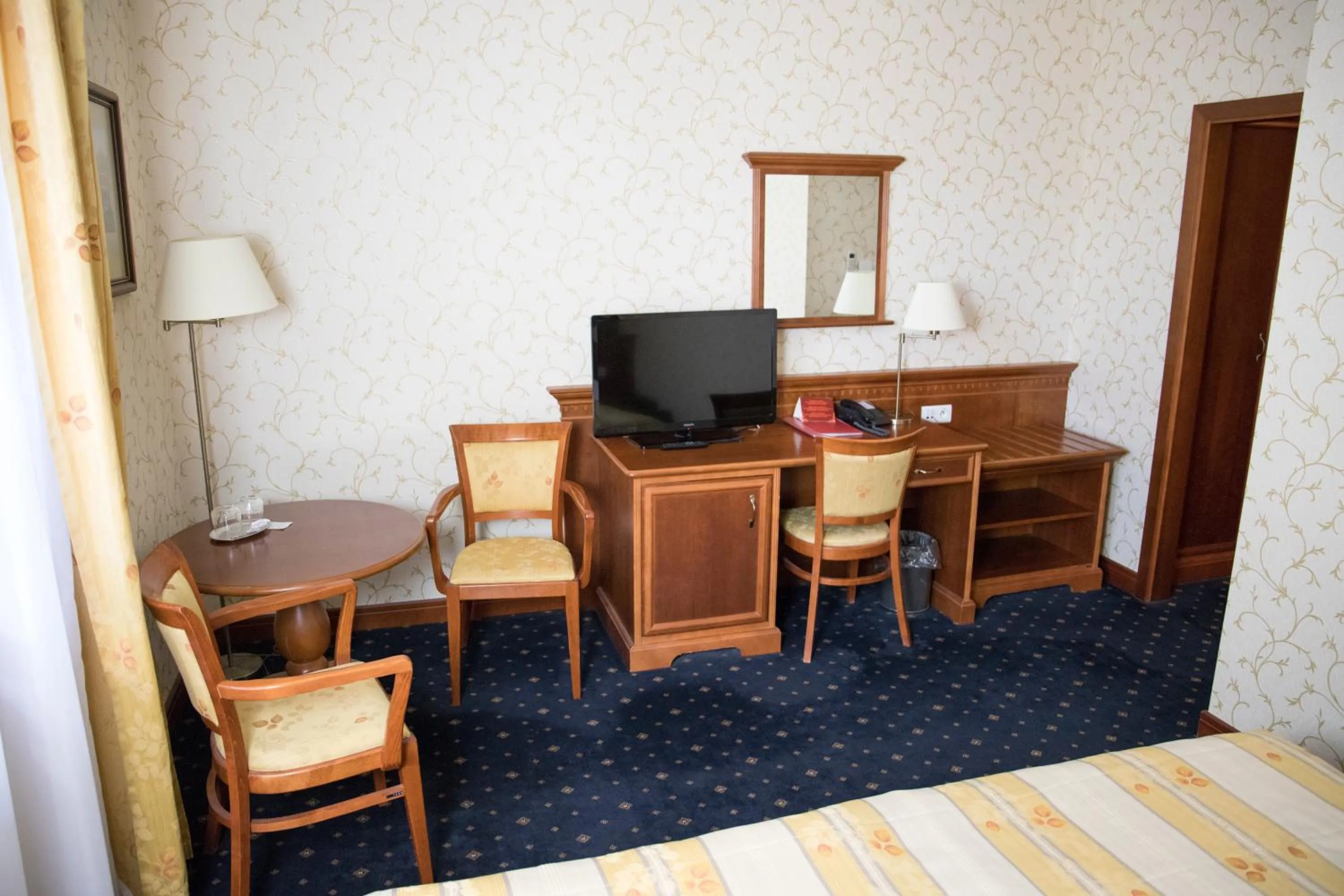 Bed, TV/Entertainment Center in Hotel sv. Ludmila