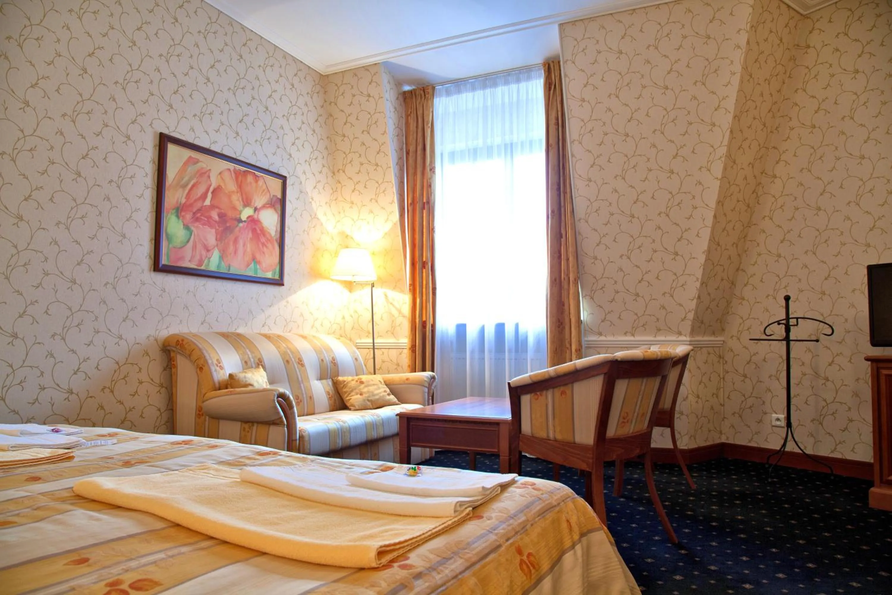 Seating area, Bed in Hotel sv. Ludmila