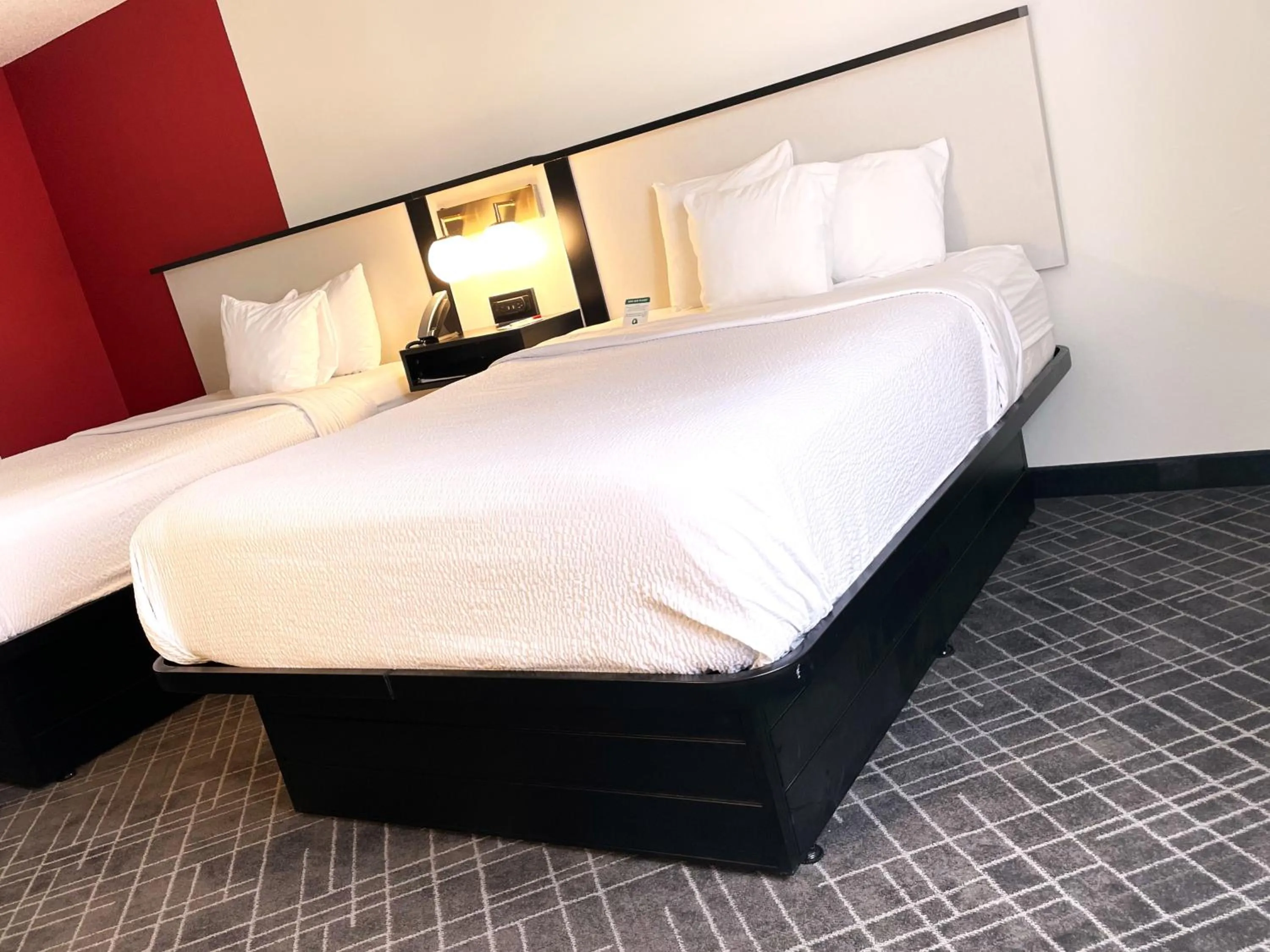 Bed in Ramada by Wyndham Waupaca
