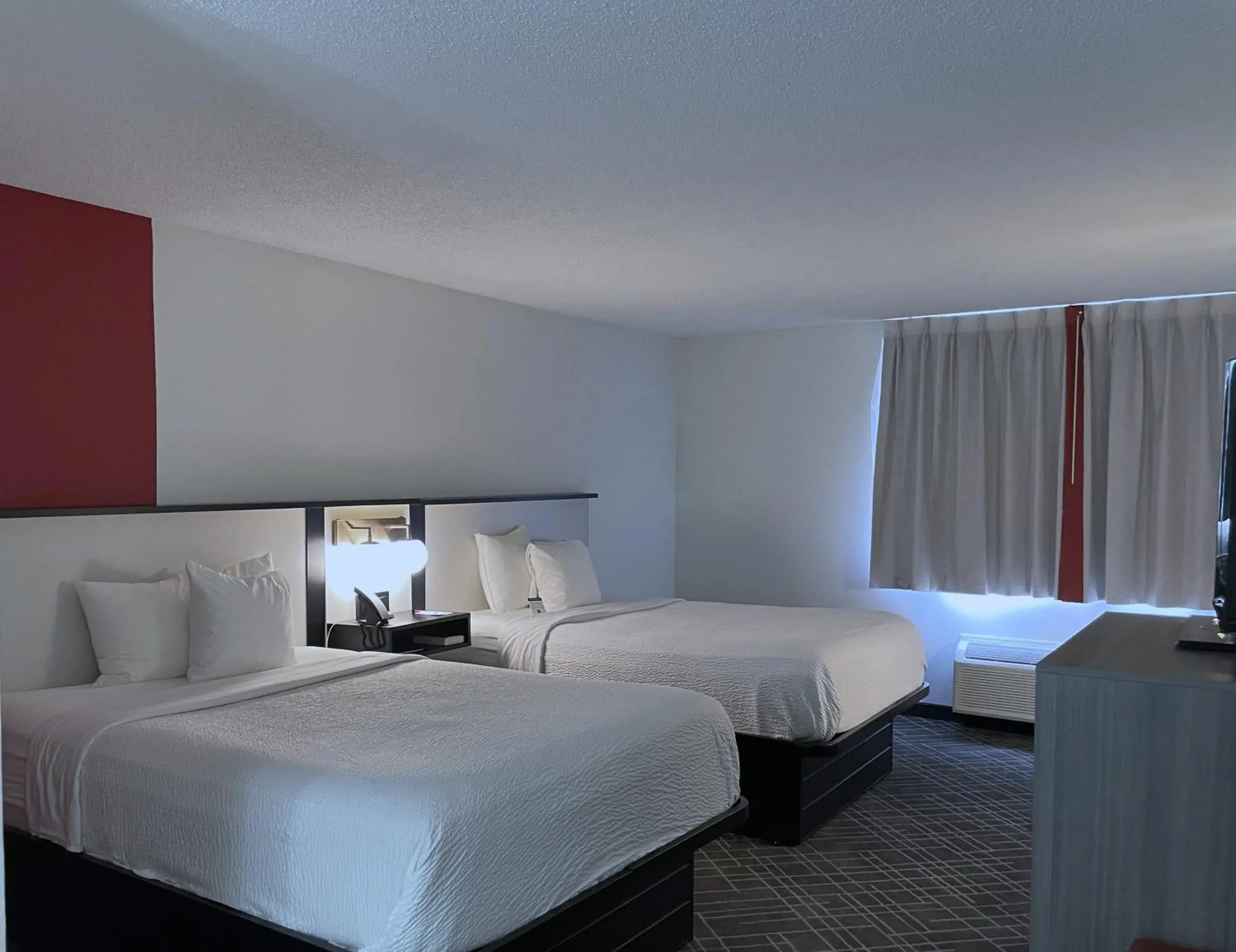 Bed in Ramada by Wyndham Waupaca Bed in Ramada by Wyndham Waupaca