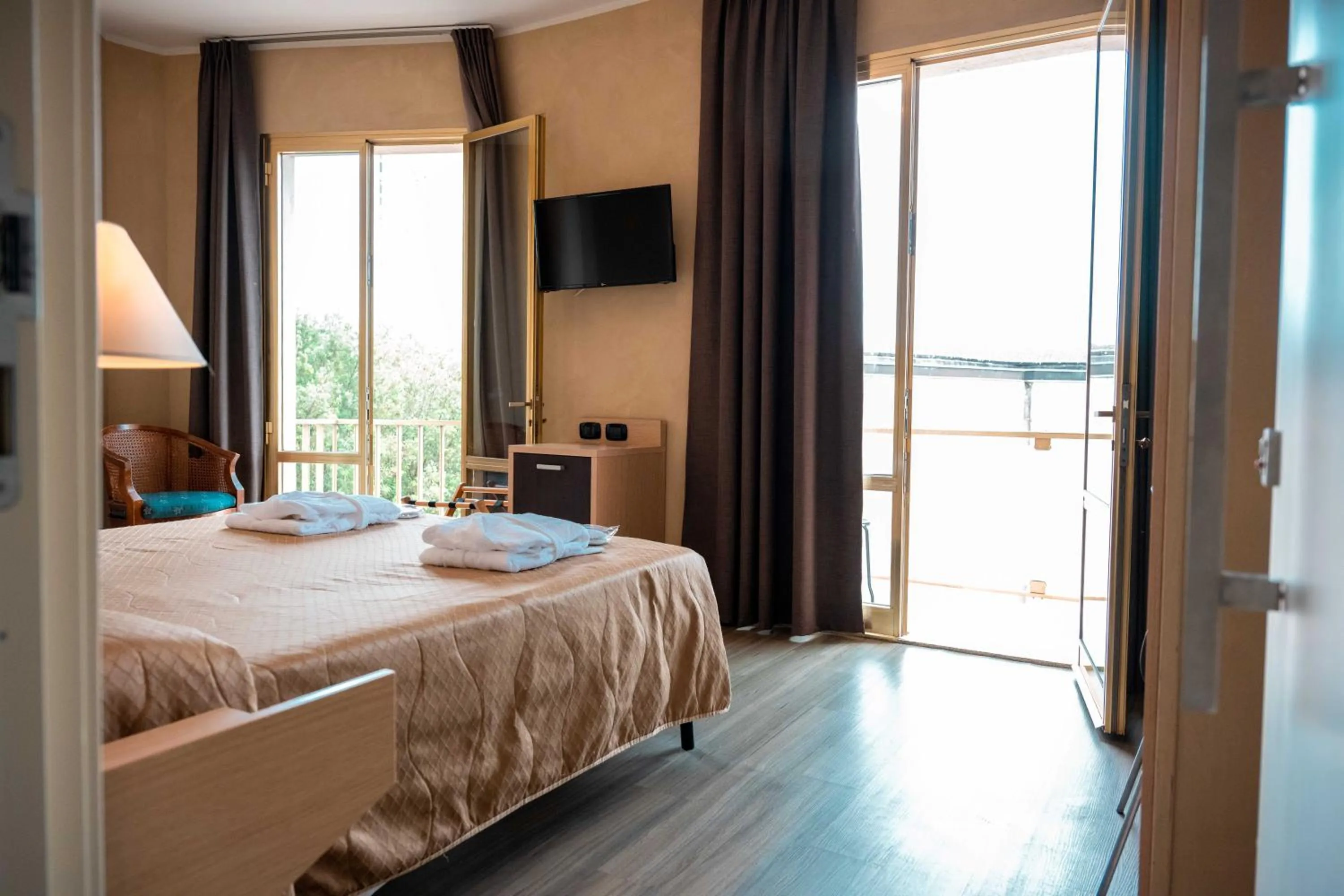 Bed in Hotel Terme Pellegrini