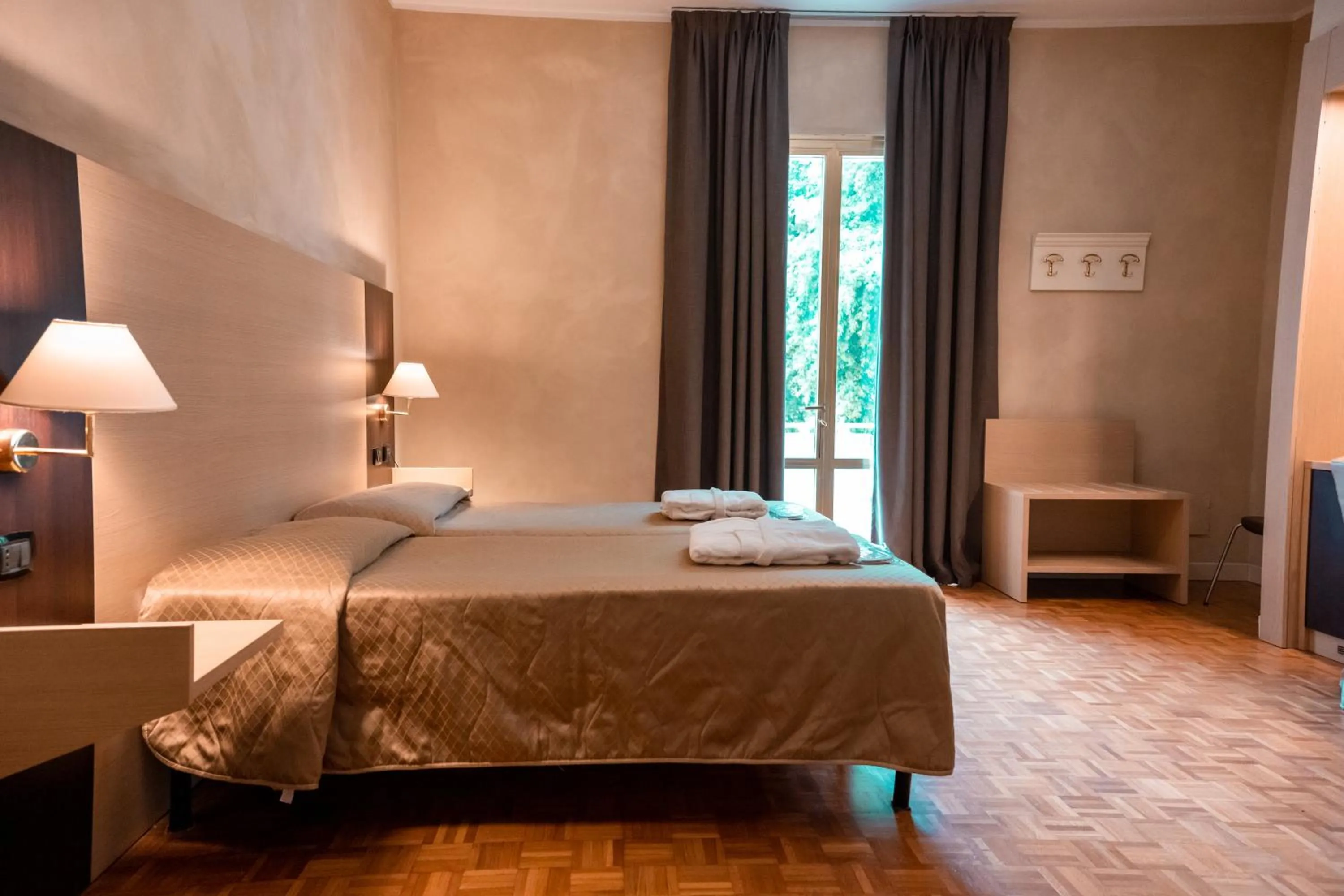 Bed in Hotel Terme Pellegrini