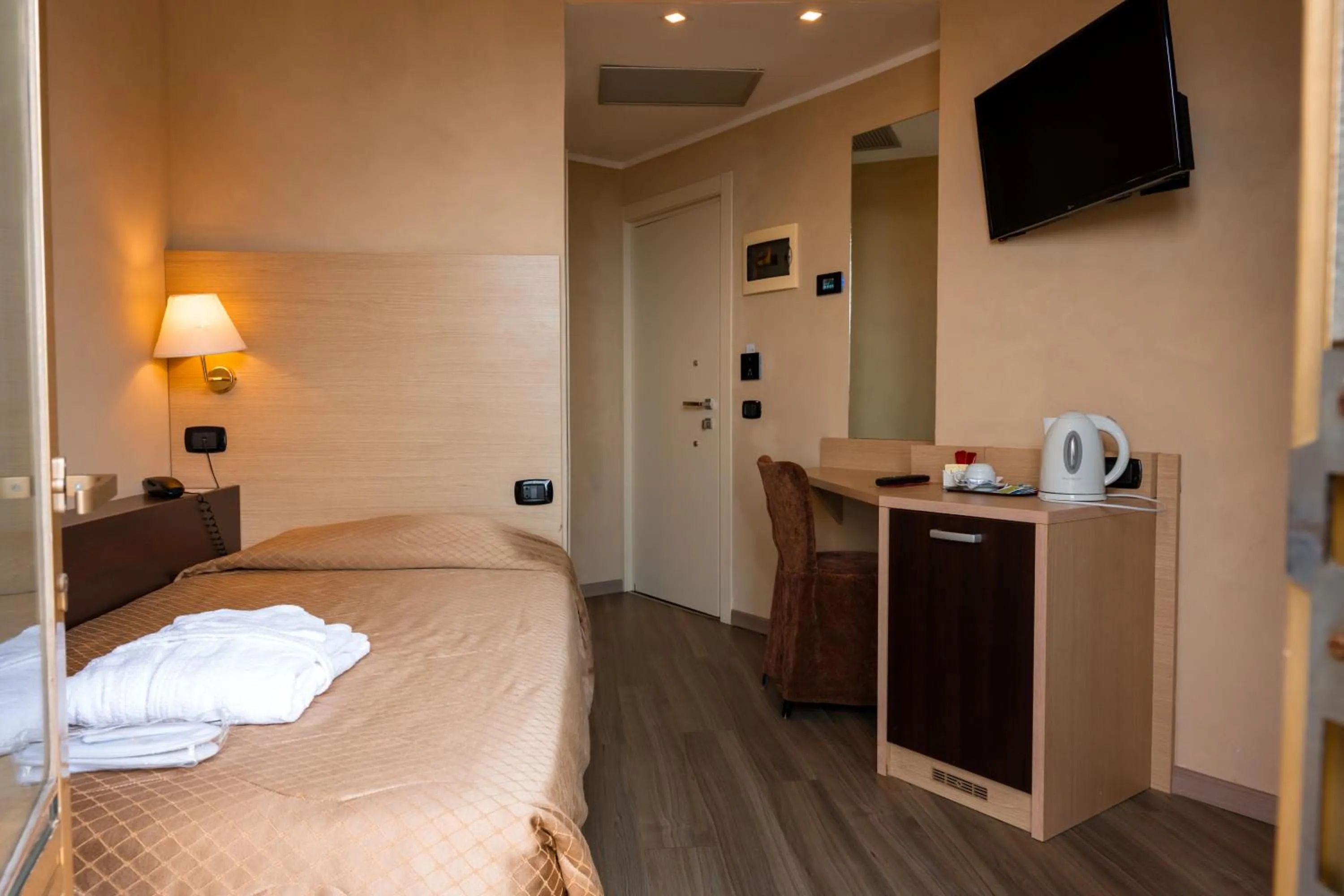 Bed in Hotel Terme Pellegrini