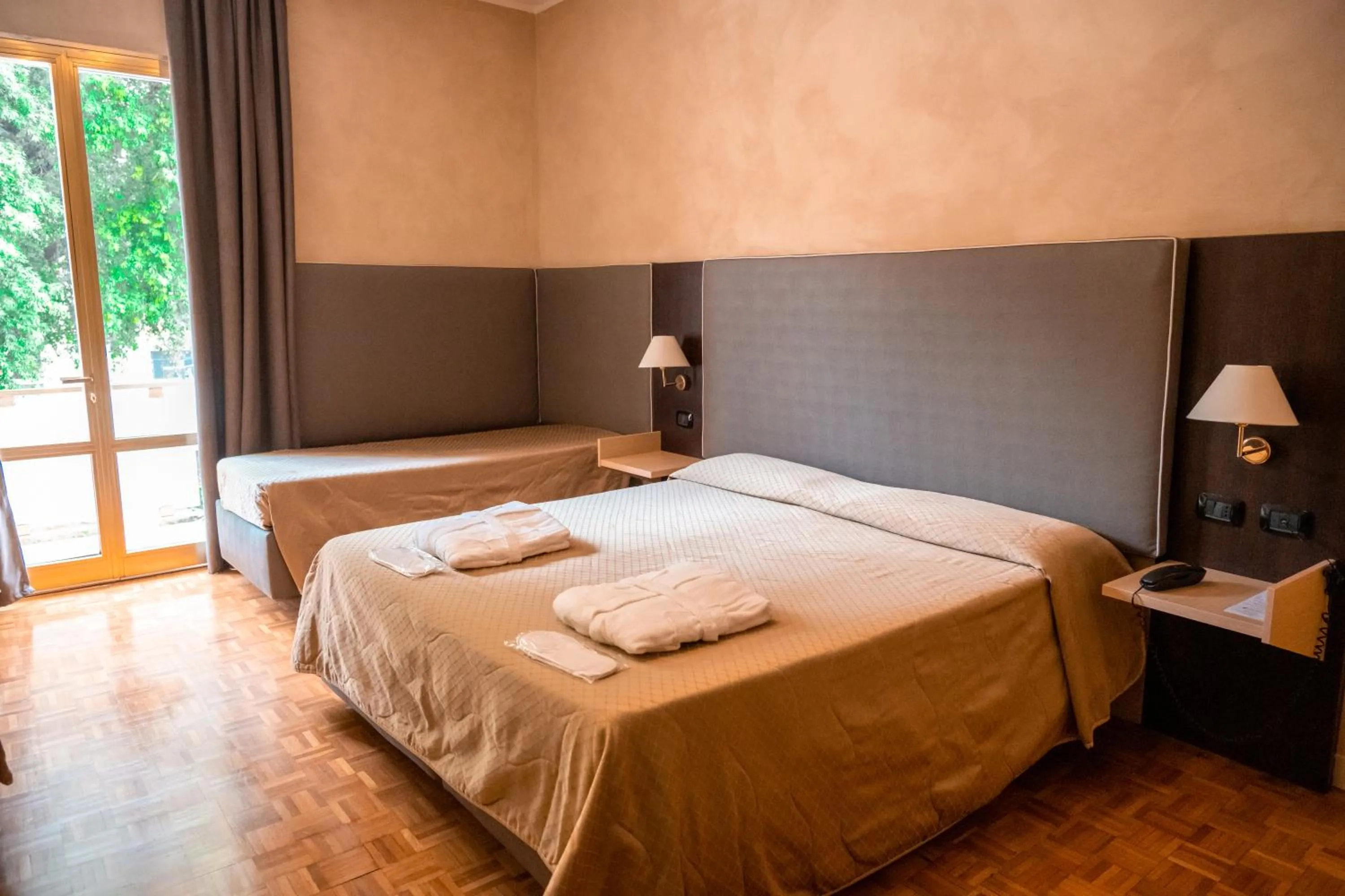 Bed in Hotel Terme Pellegrini