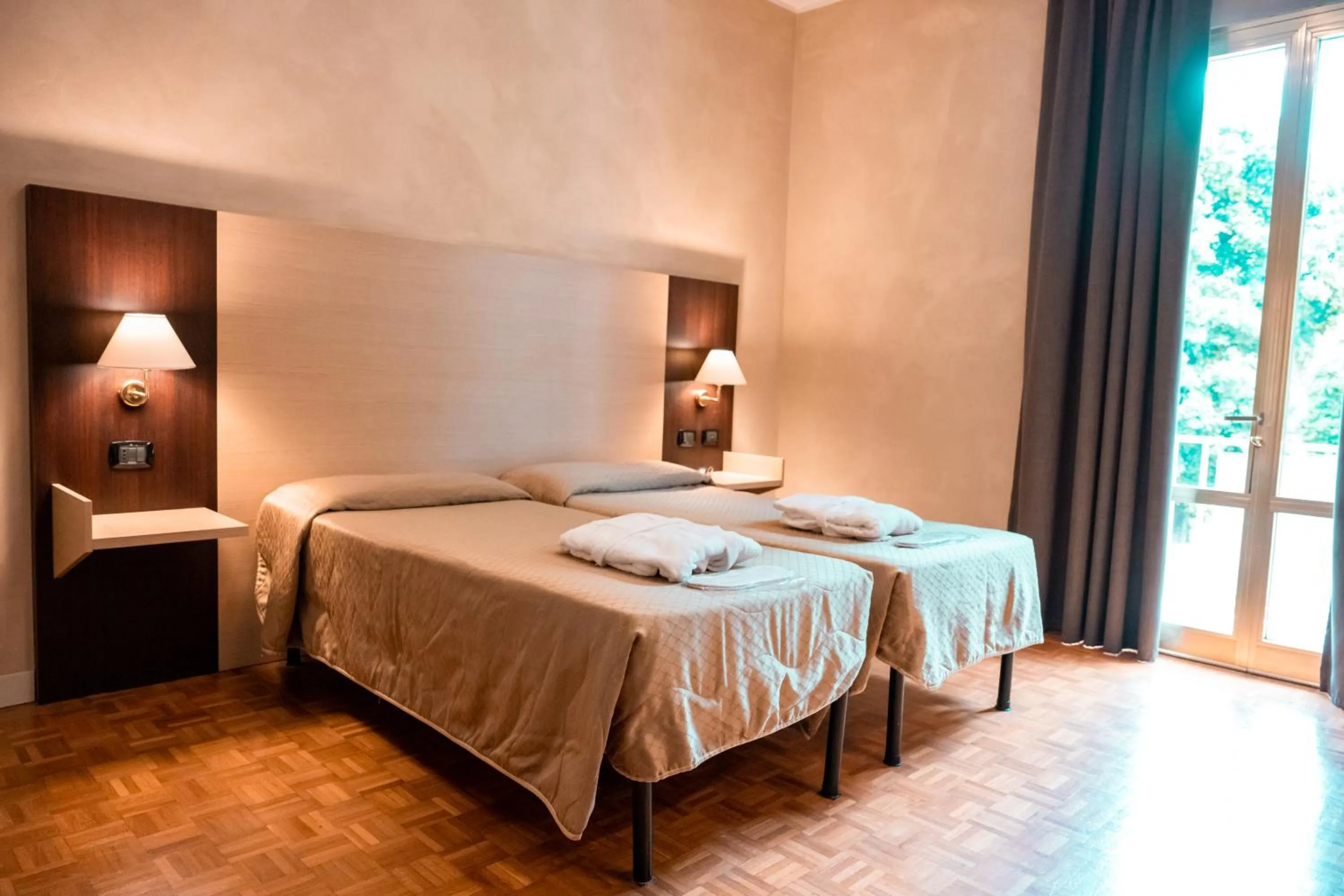 Bed in Hotel Terme Pellegrini