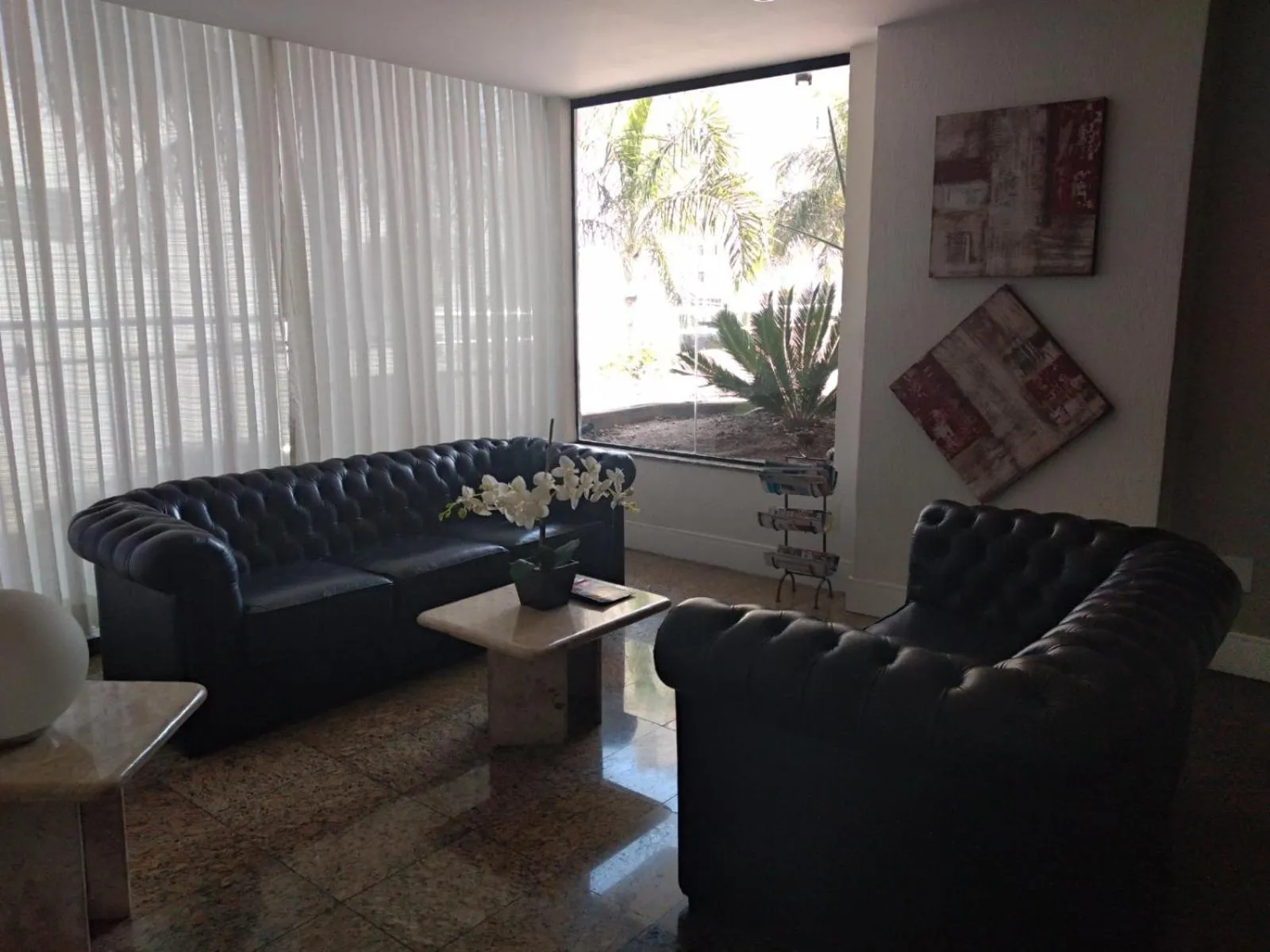 Lobby or reception in Plaza Suite Hotel