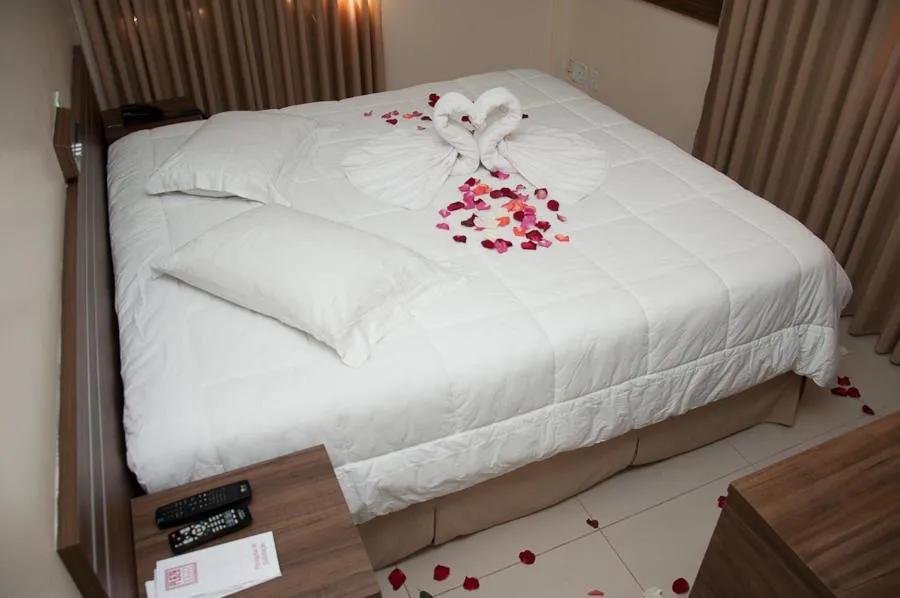 Bed in Plaza Suite Hotel