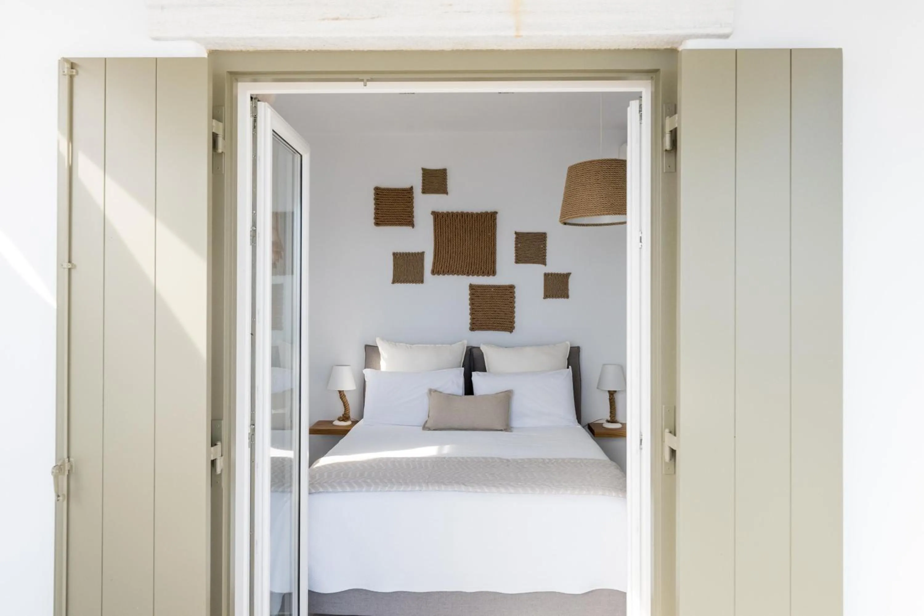Bed in VATHI BLEU PRIVATE VILLAS