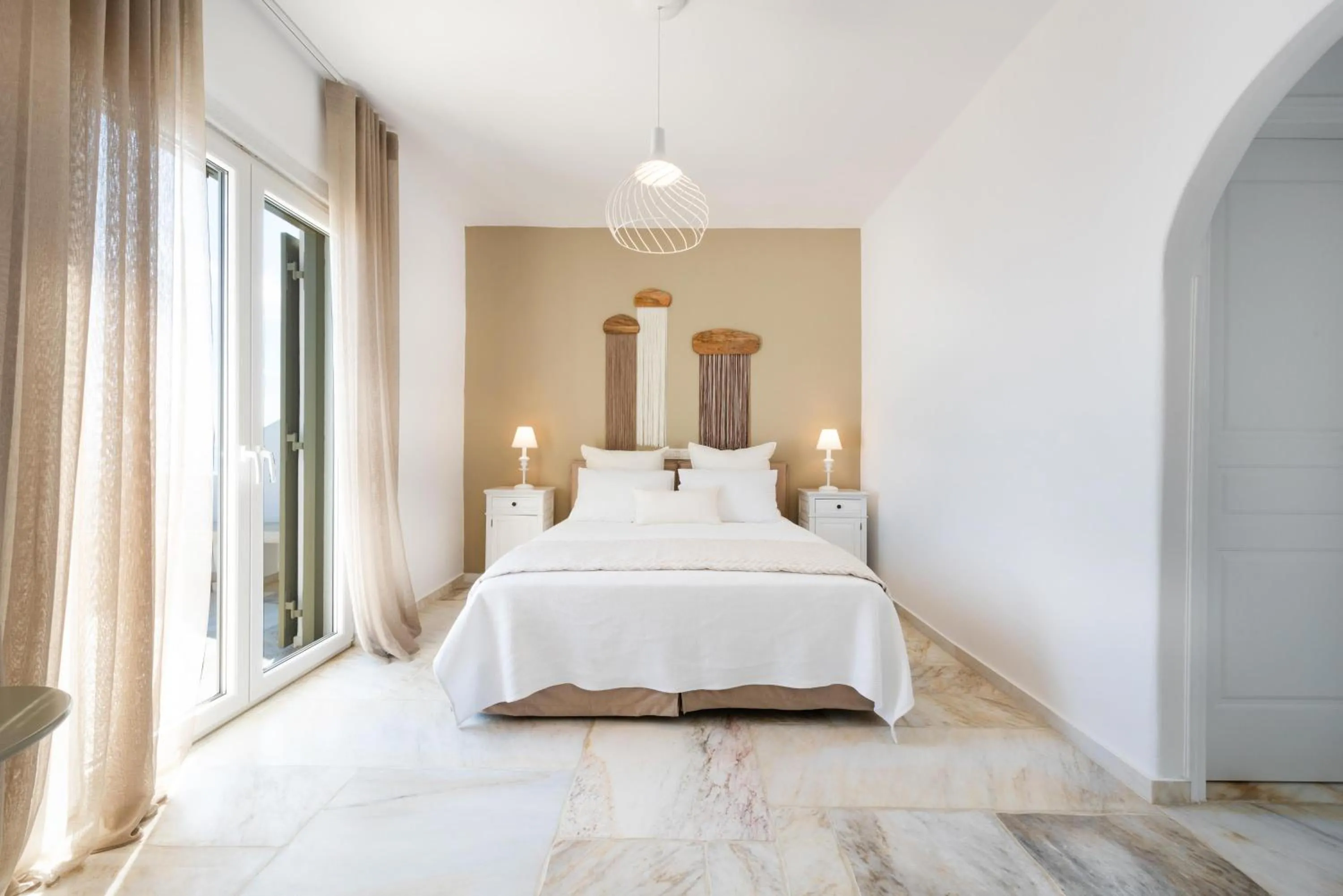 Bed in VATHI BLEU PRIVATE VILLAS