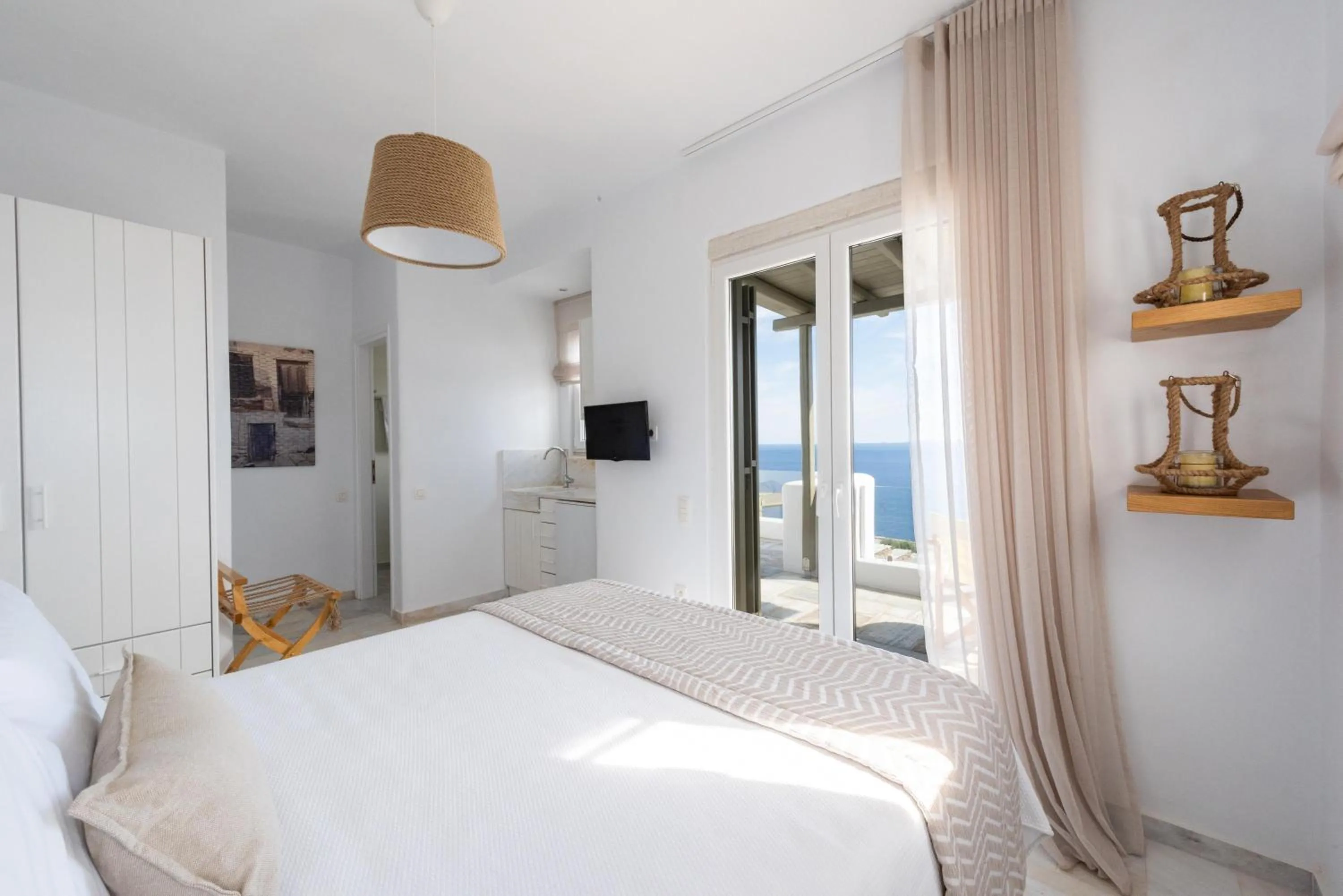 Bed in VATHI BLEU PRIVATE VILLAS