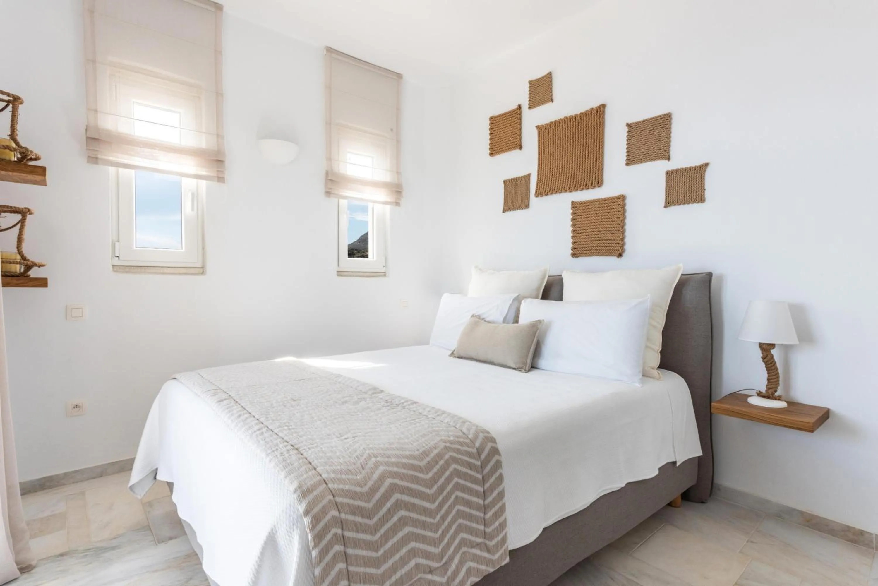 Bed in VATHI BLEU PRIVATE VILLAS