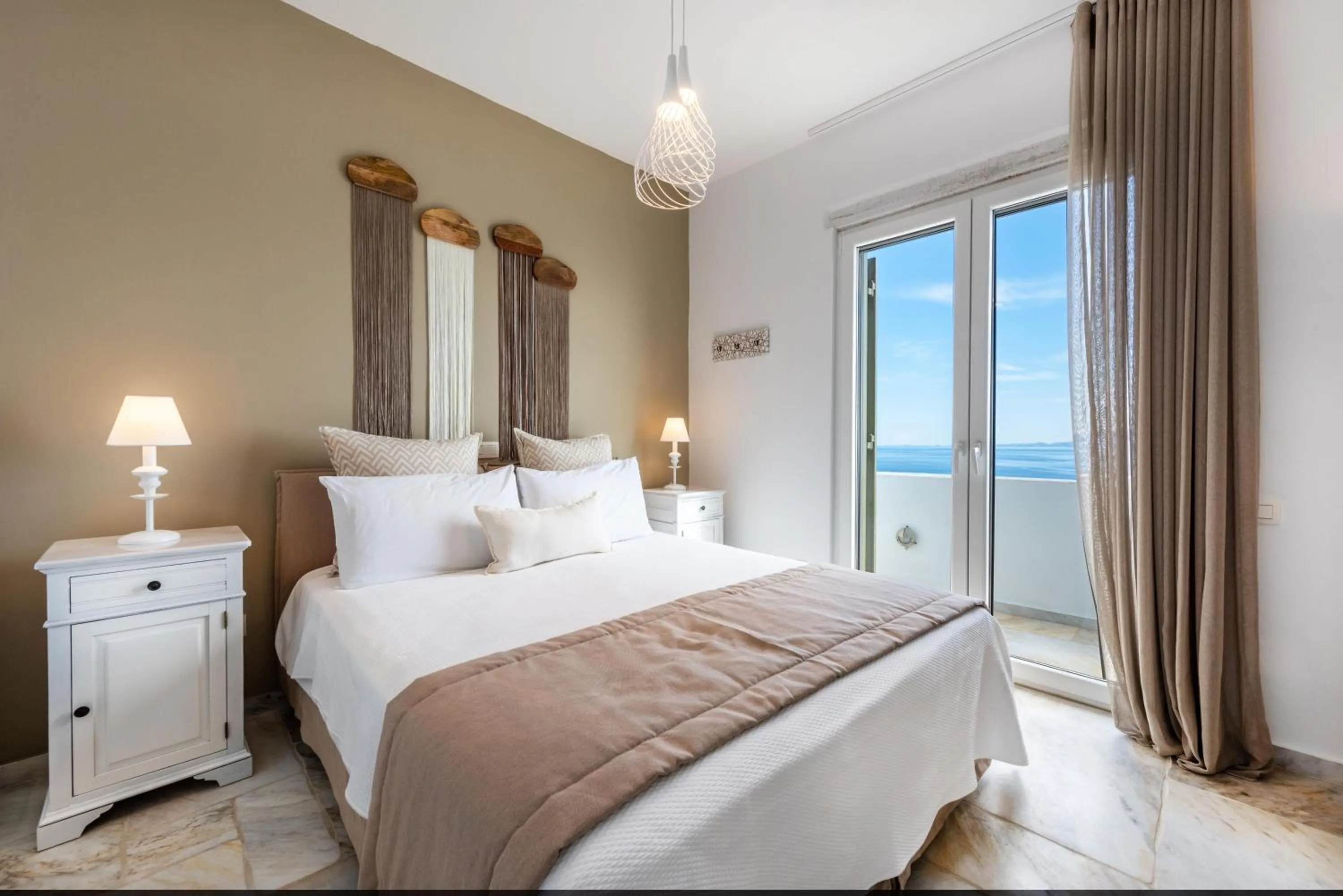 Bed in VATHI BLEU PRIVATE VILLAS