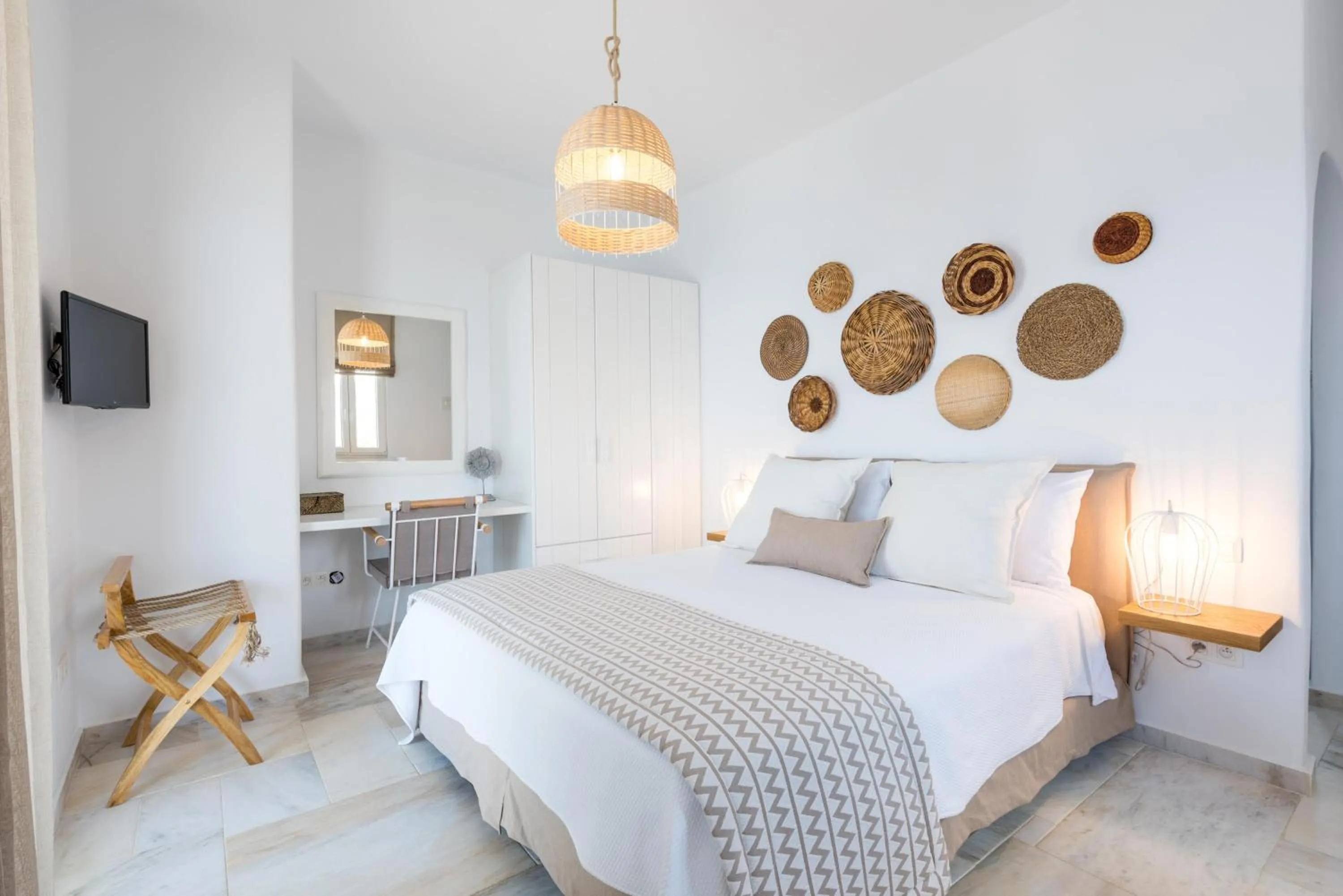 Bed in VATHI BLEU PRIVATE VILLAS