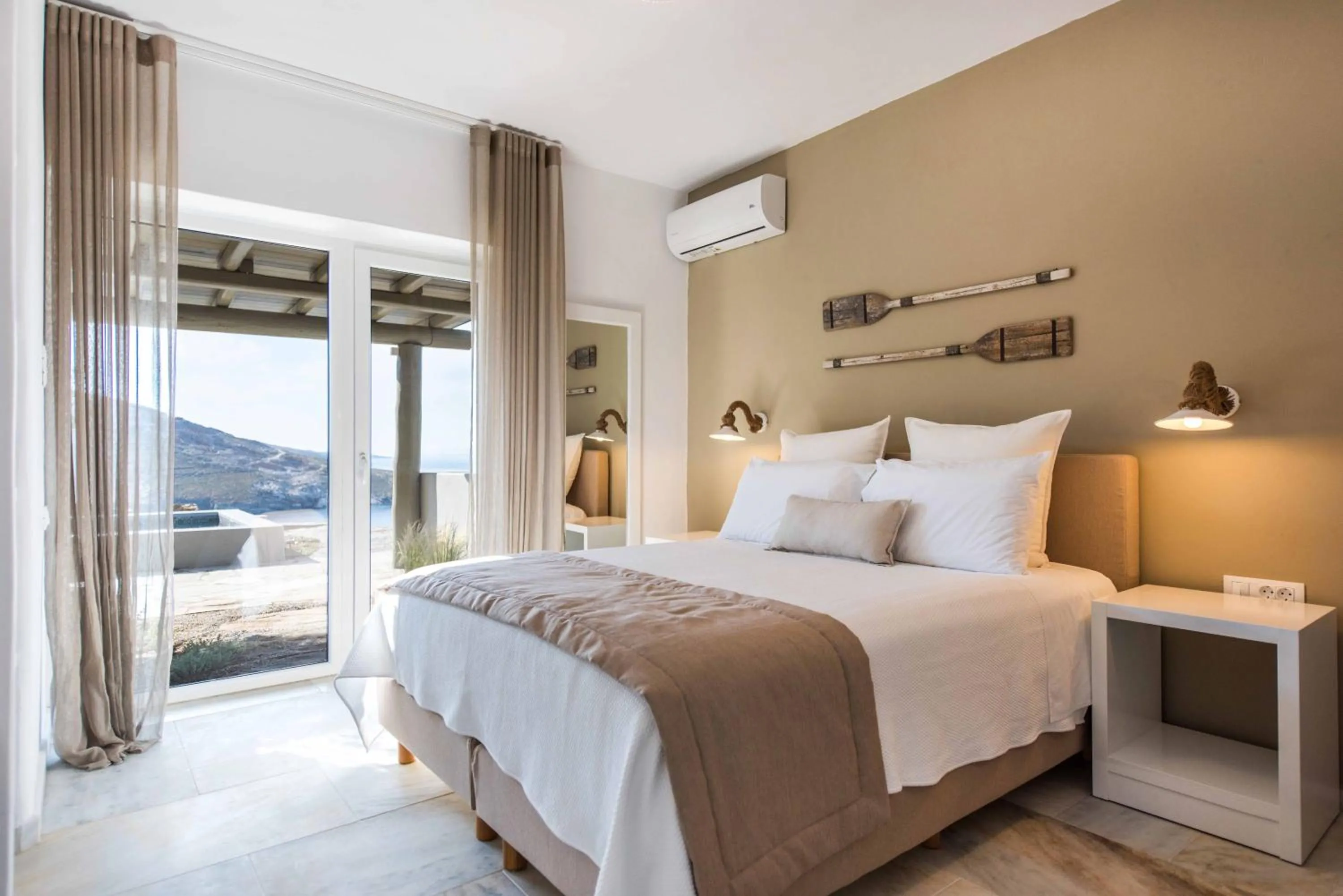 Bed in VATHI BLEU PRIVATE VILLAS