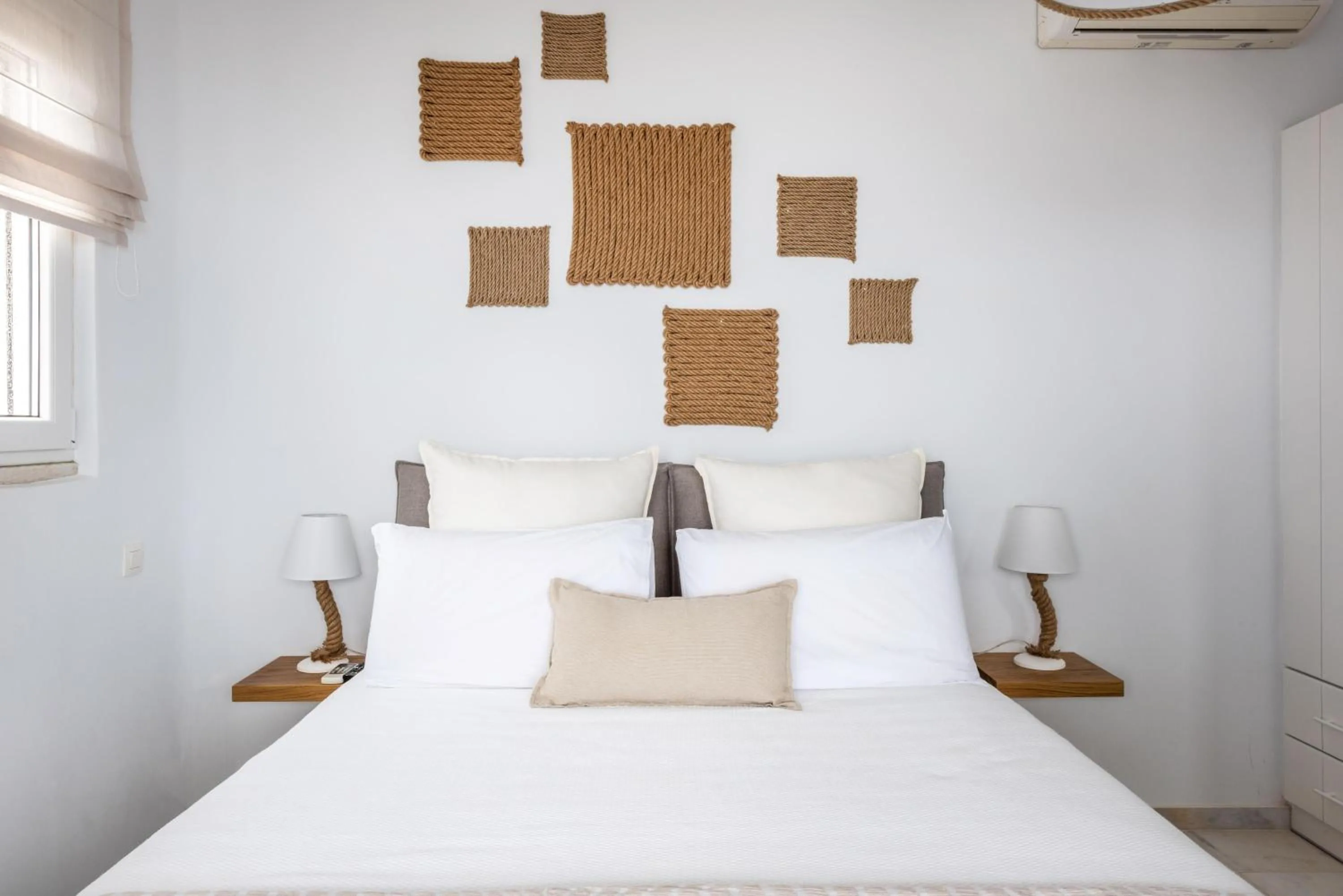 Bed in VATHI BLEU PRIVATE VILLAS