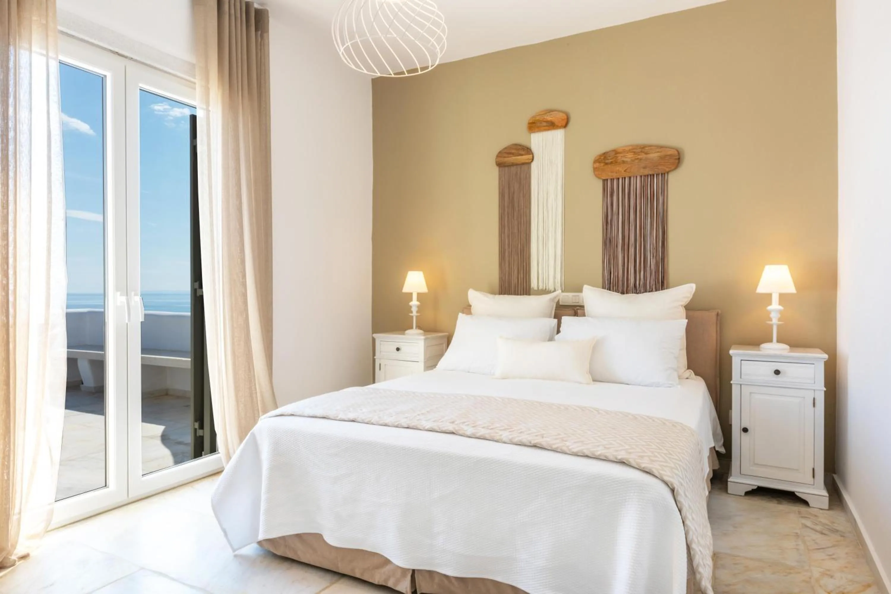 Bed in VATHI BLEU PRIVATE VILLAS