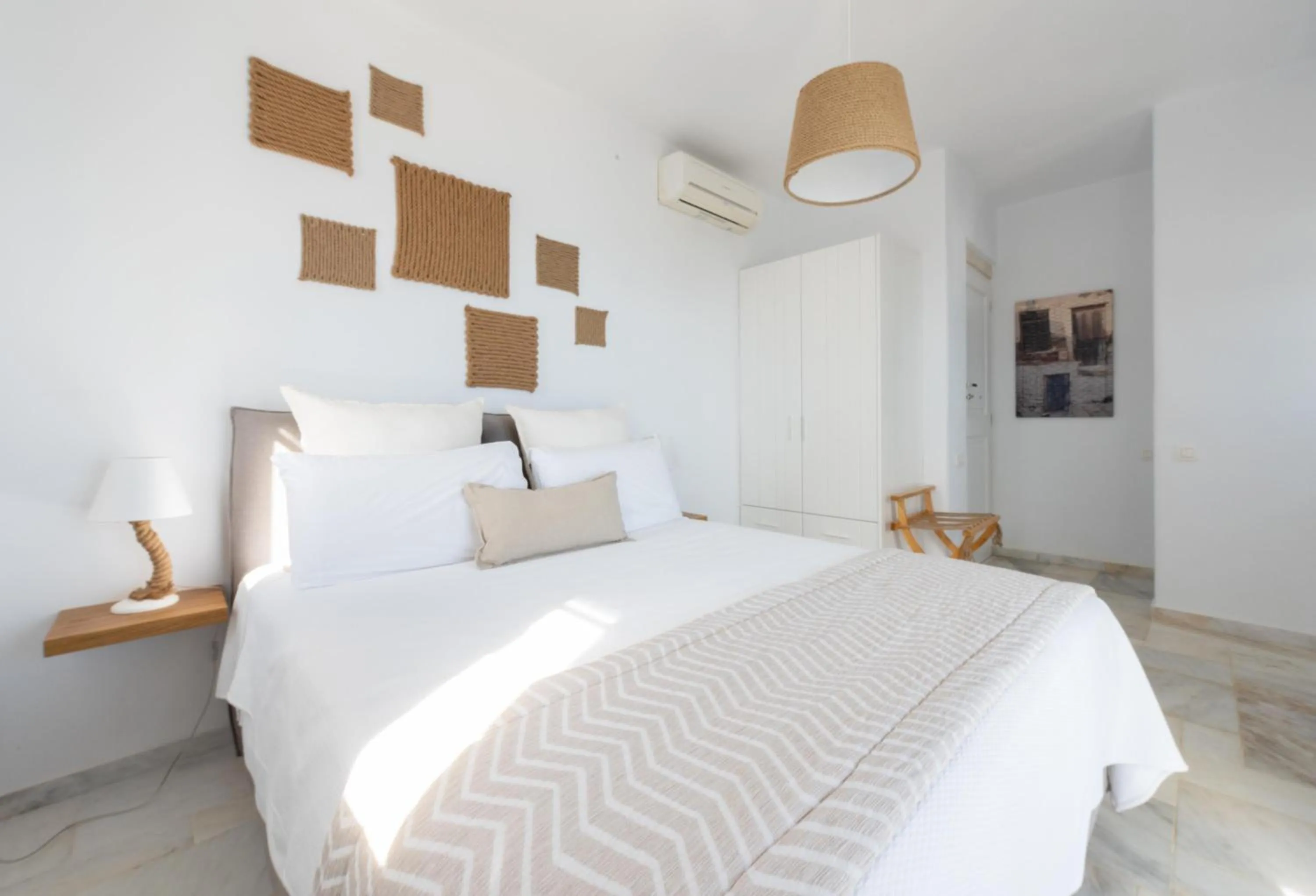 Bed in VATHI BLEU PRIVATE VILLAS