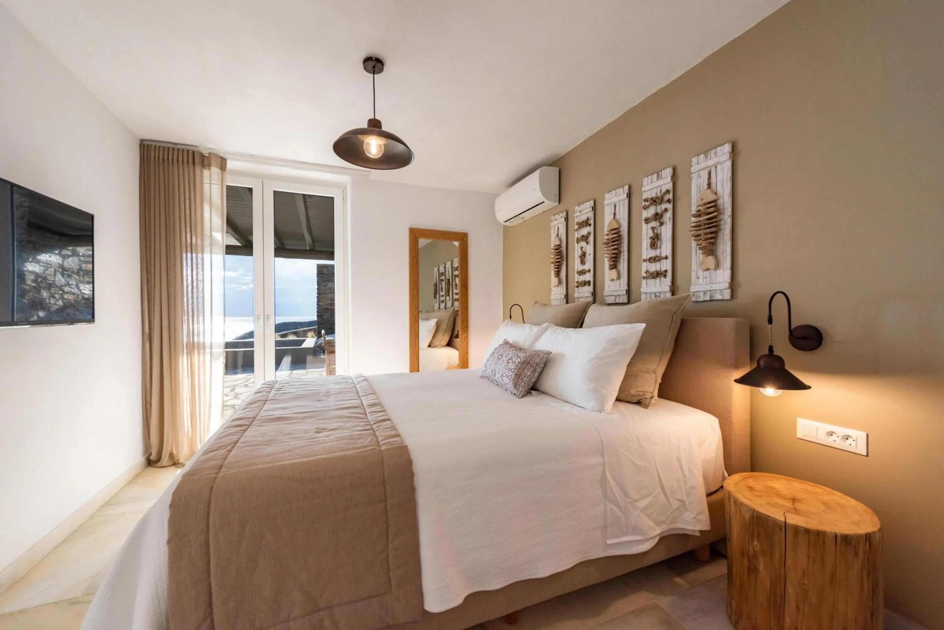 Bed in VATHI BLEU PRIVATE VILLAS