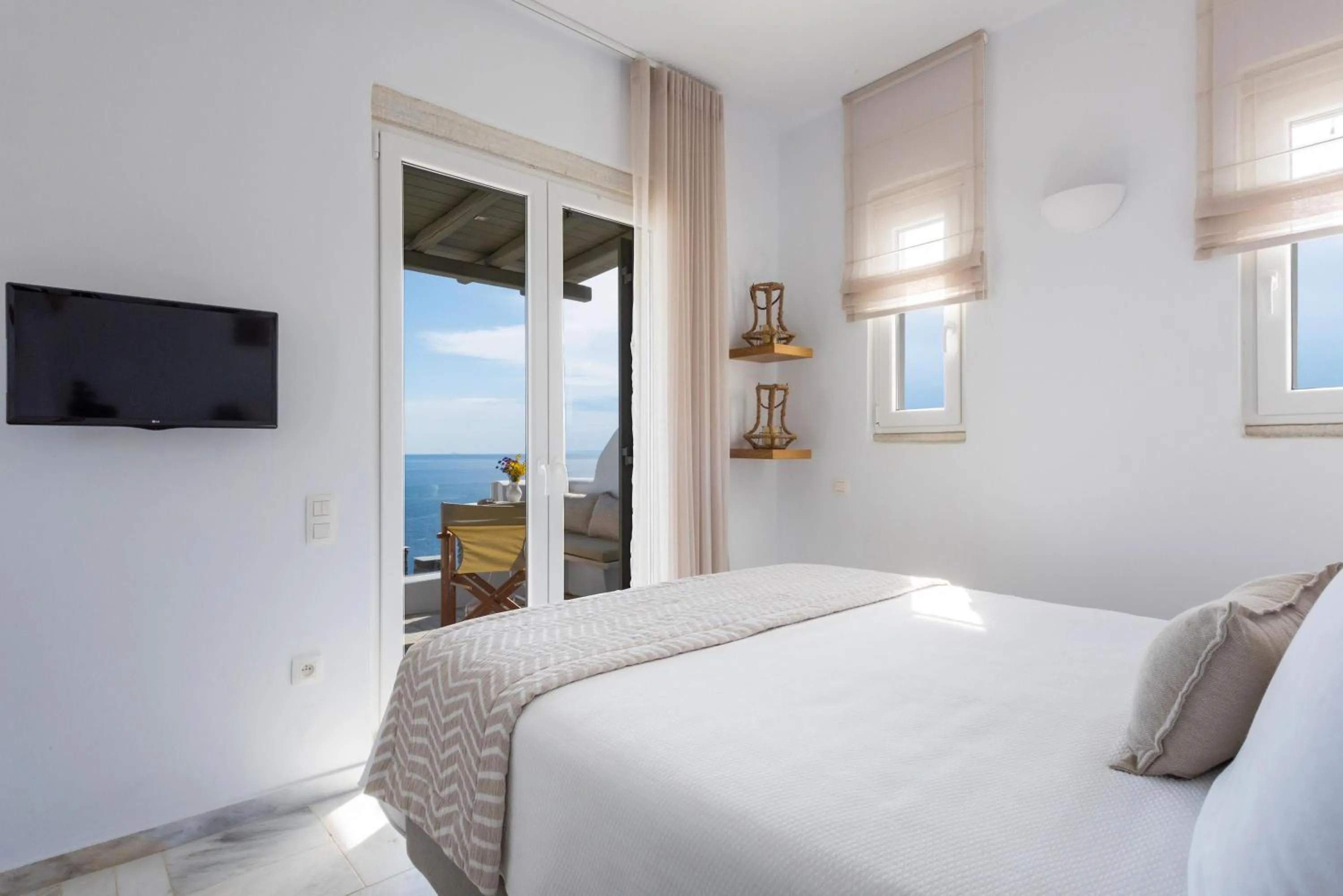 Bed in VATHI BLEU PRIVATE VILLAS