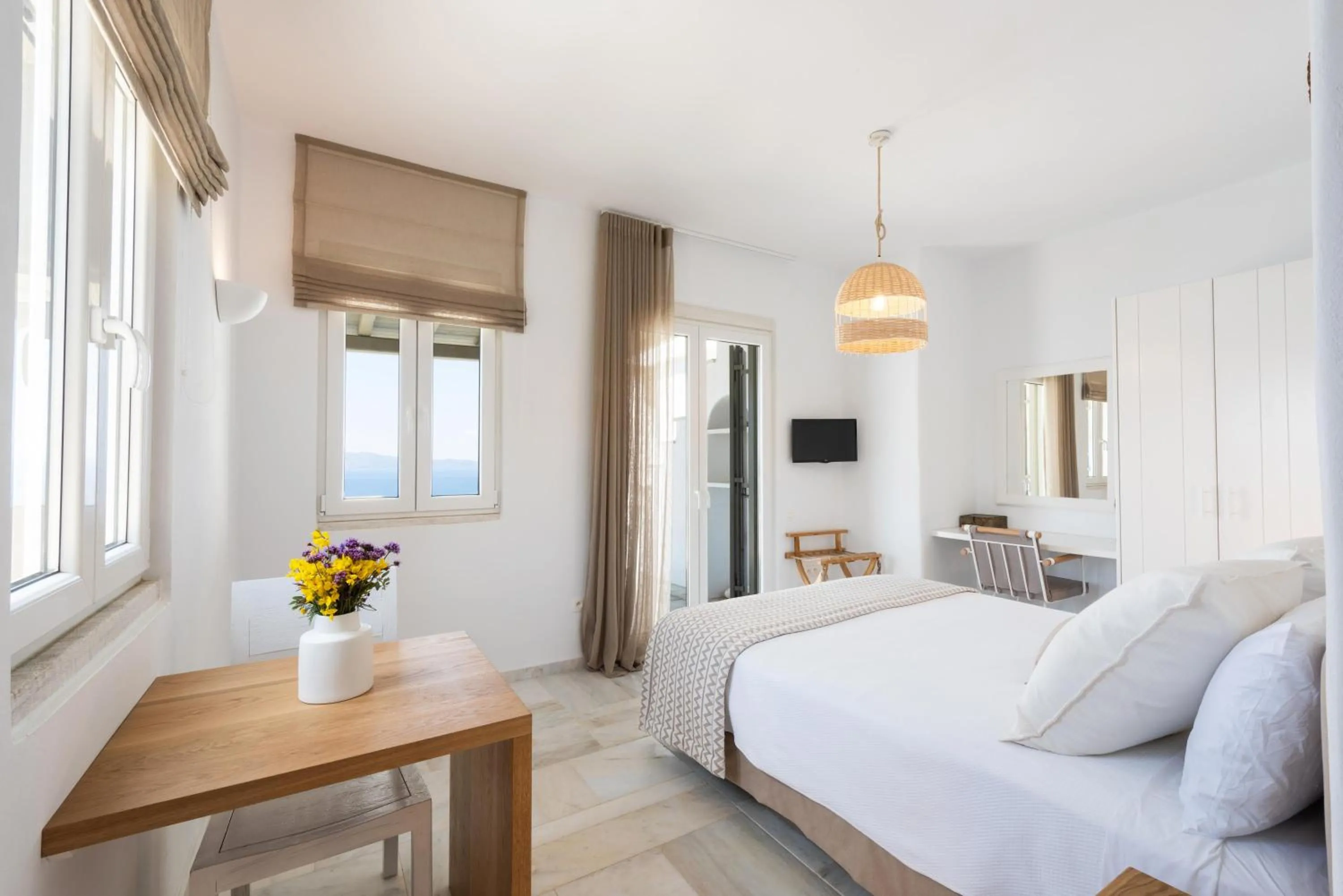 Bed in VATHI BLEU PRIVATE VILLAS