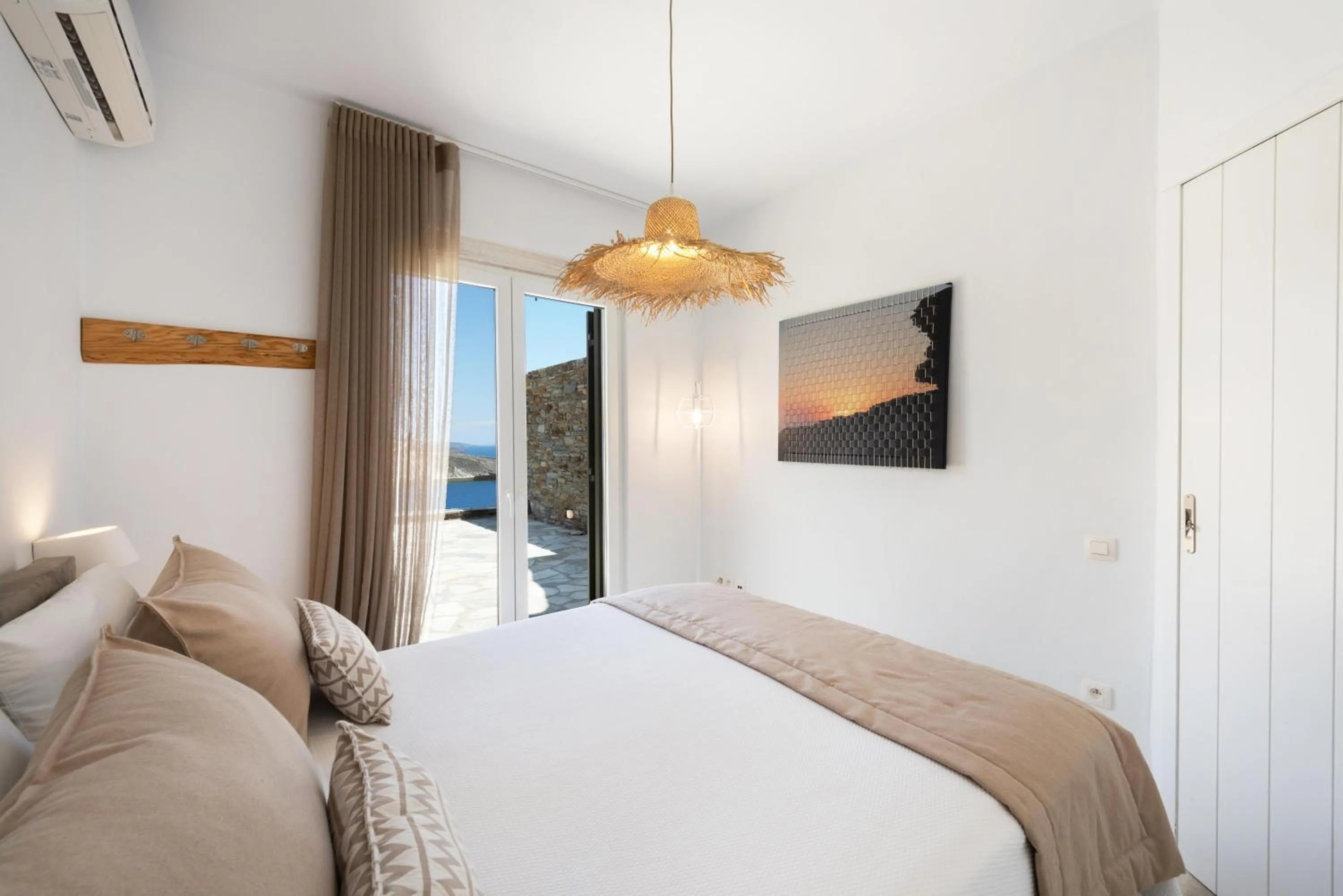 Bed in VATHI BLEU PRIVATE VILLAS