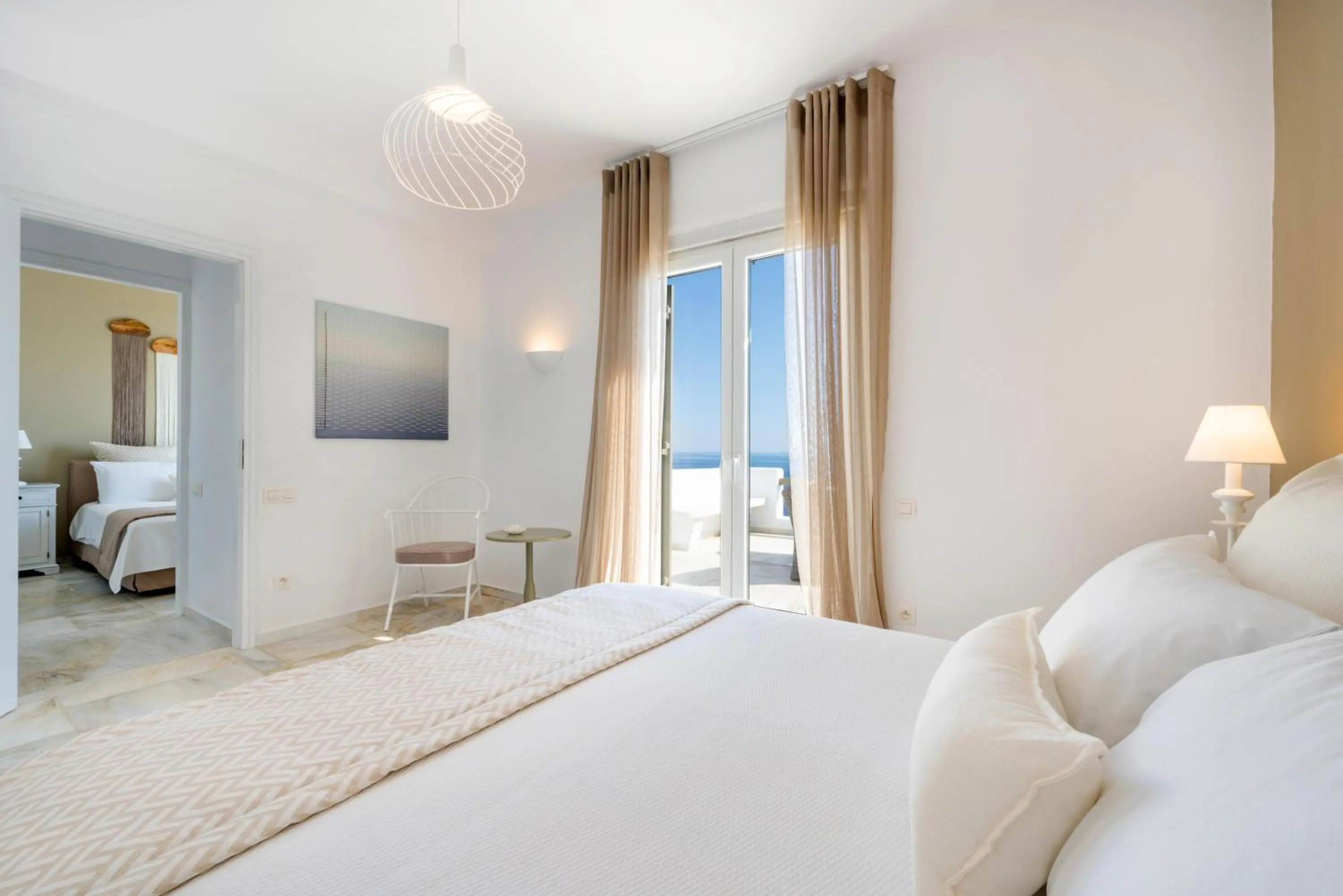 Bed in VATHI BLEU PRIVATE VILLAS