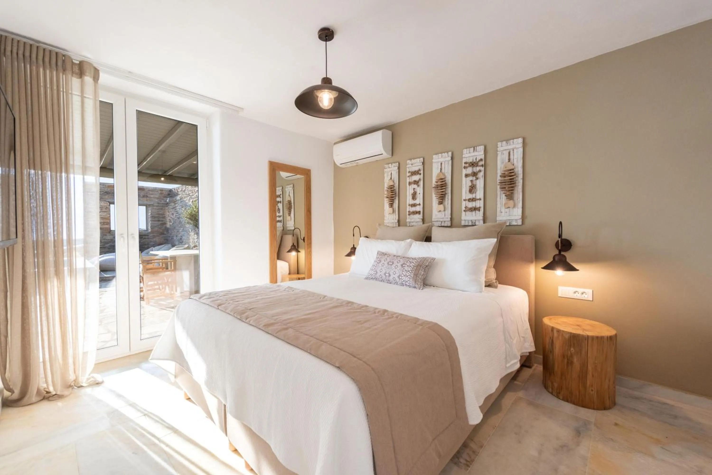Bed in VATHI BLEU PRIVATE VILLAS