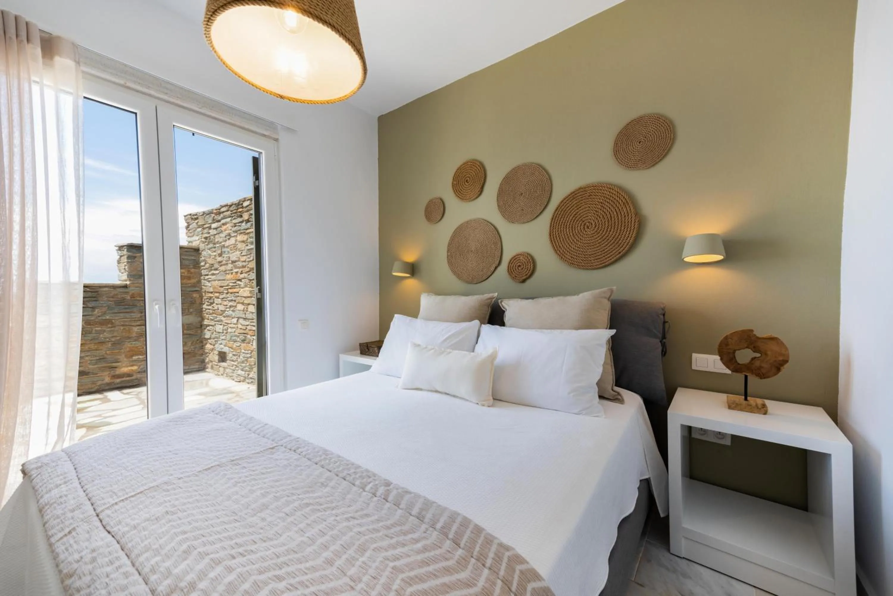 Bed in VATHI BLEU PRIVATE VILLAS