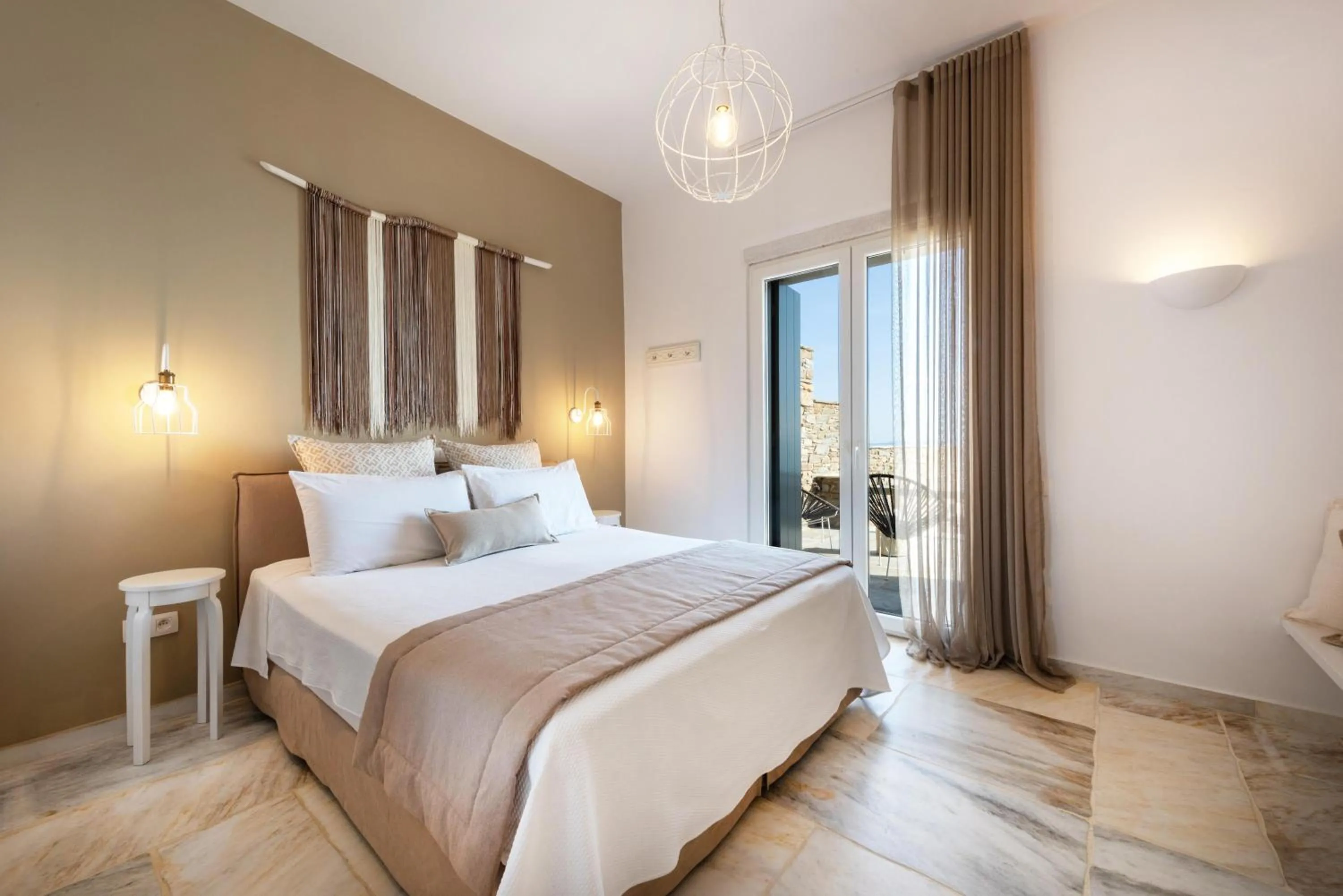 Bed in VATHI BLEU PRIVATE VILLAS