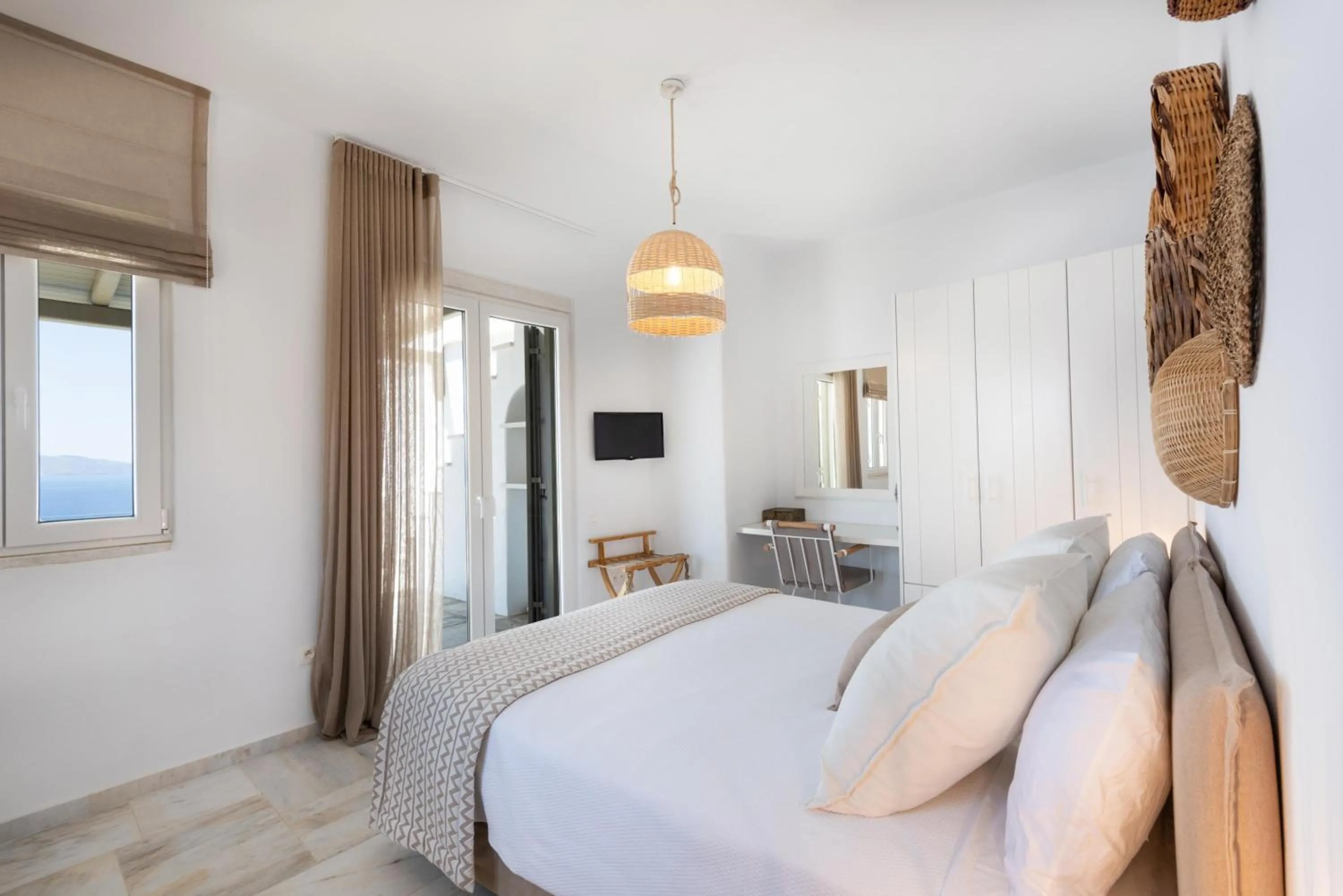 Bed in VATHI BLEU PRIVATE VILLAS