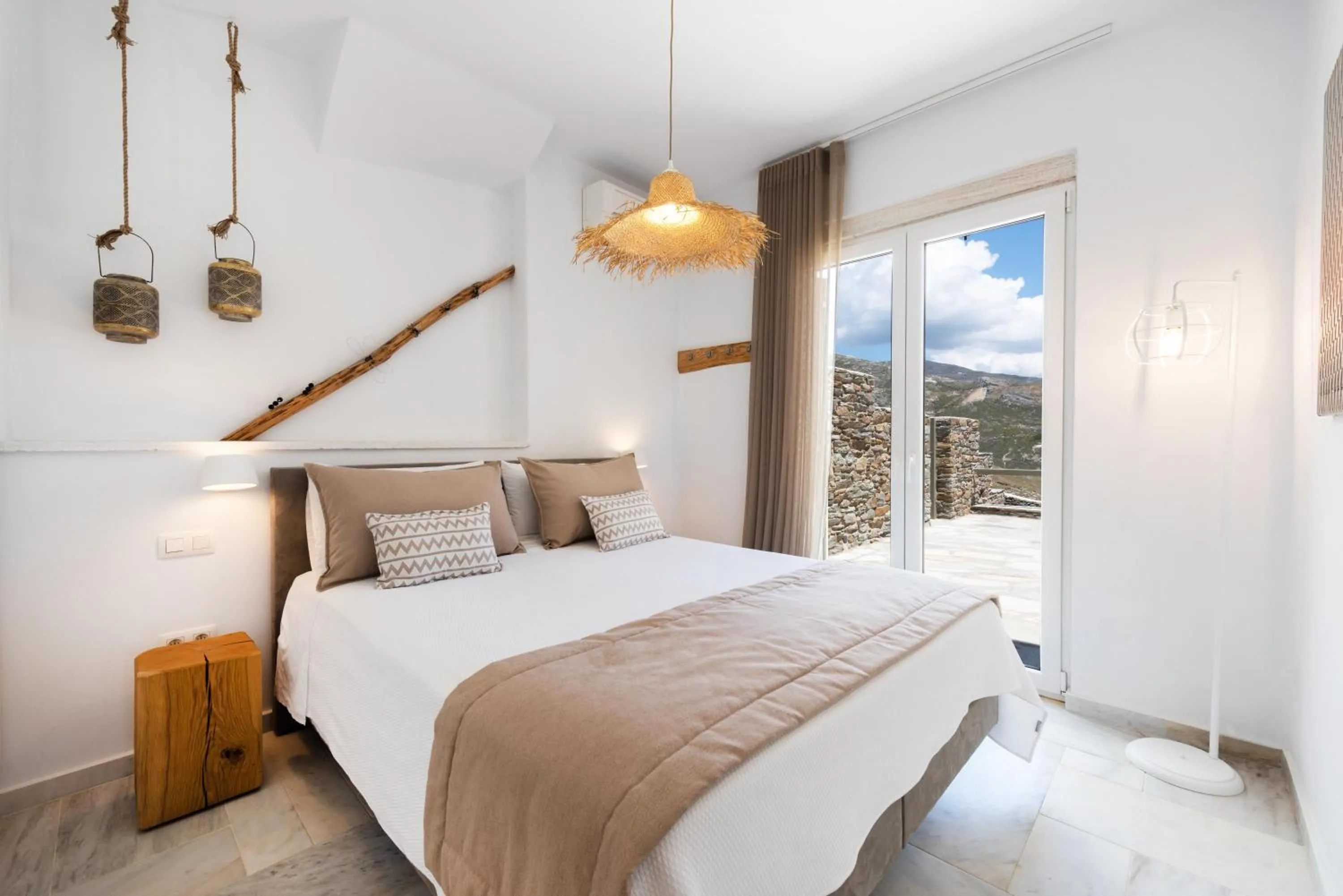 Bed in VATHI BLEU PRIVATE VILLAS