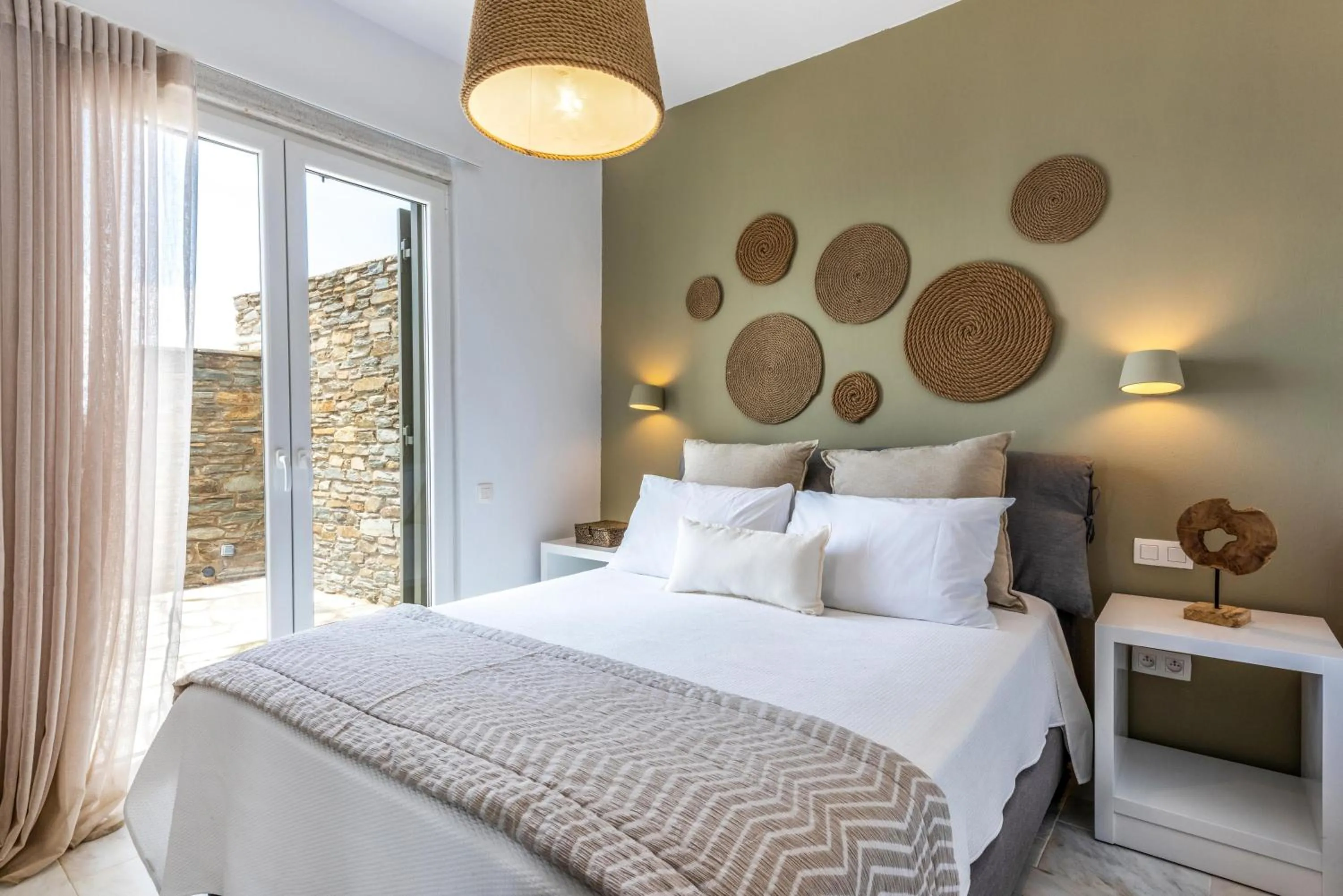 Bed in VATHI BLEU PRIVATE VILLAS
