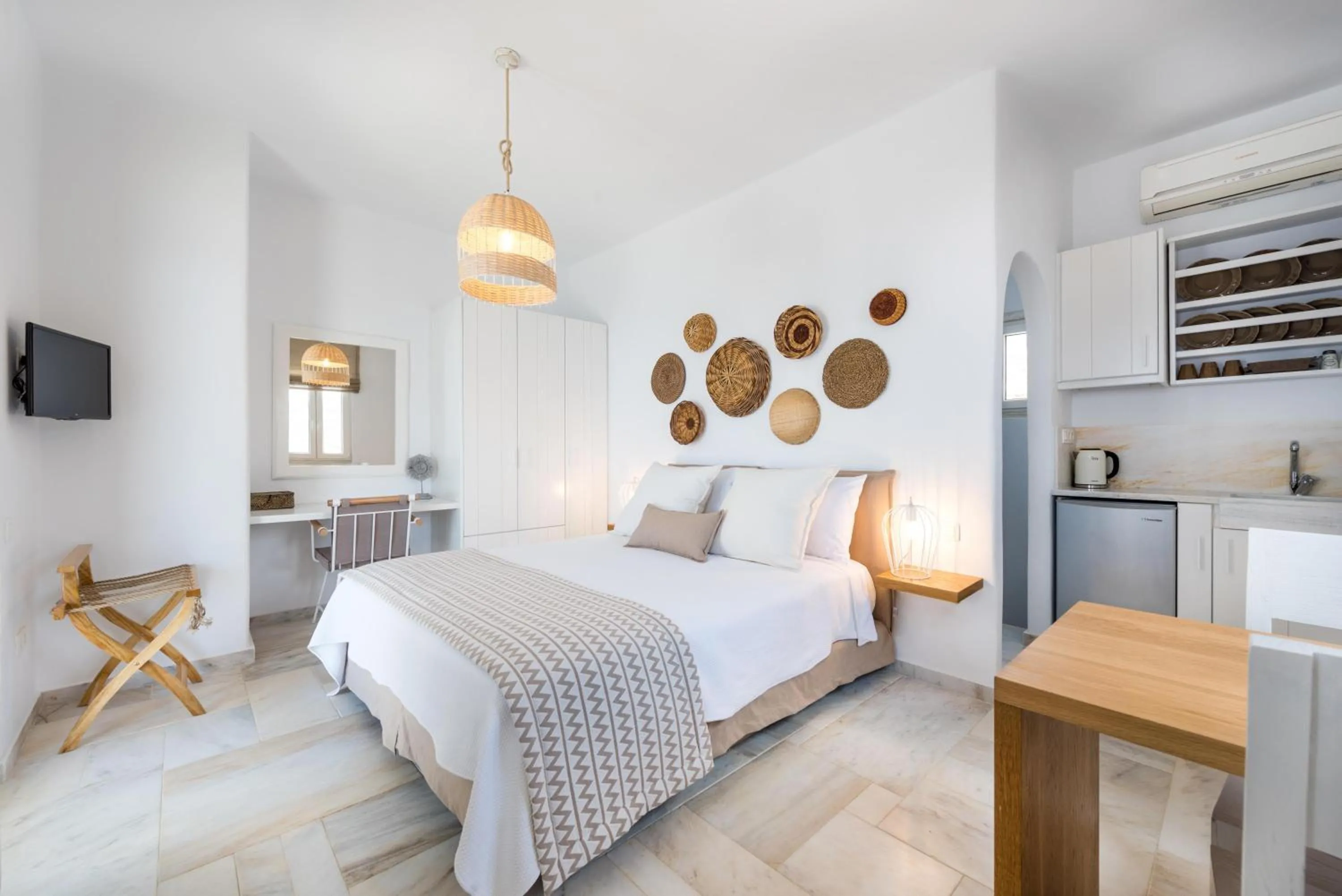 Bed in VATHI BLEU PRIVATE VILLAS