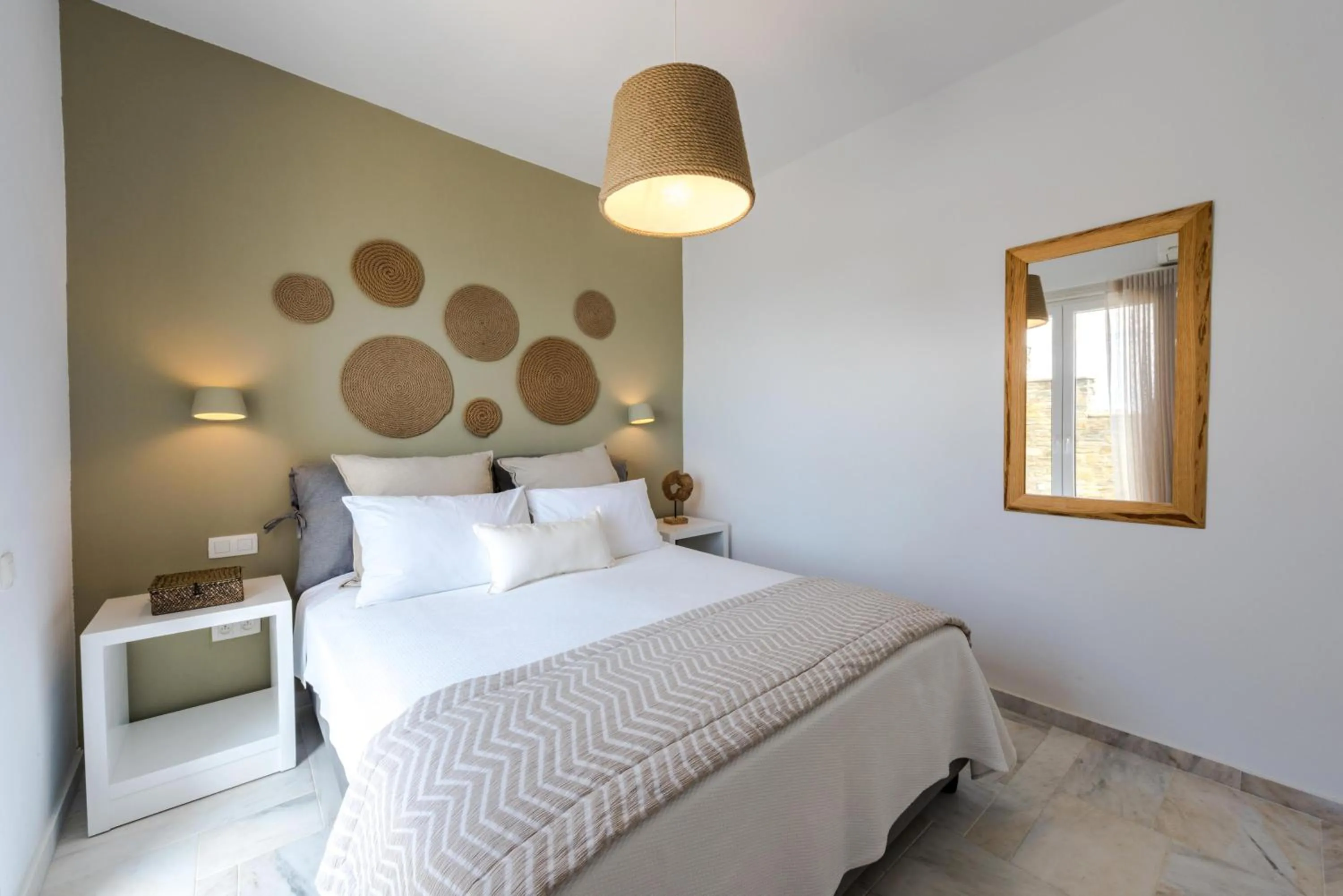 Bed in VATHI BLEU PRIVATE VILLAS