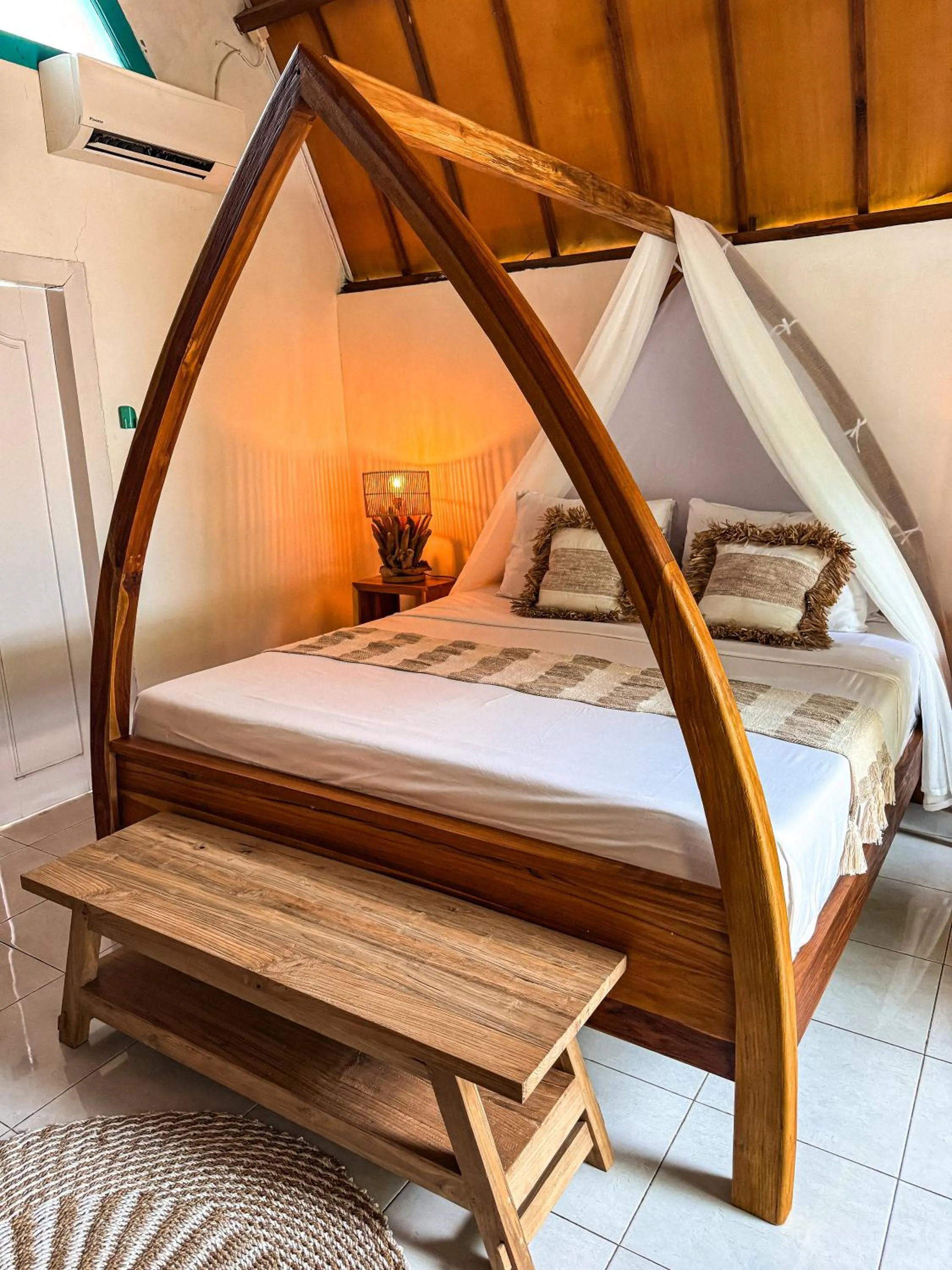 Bed in Pelangi Cottages Gili Air