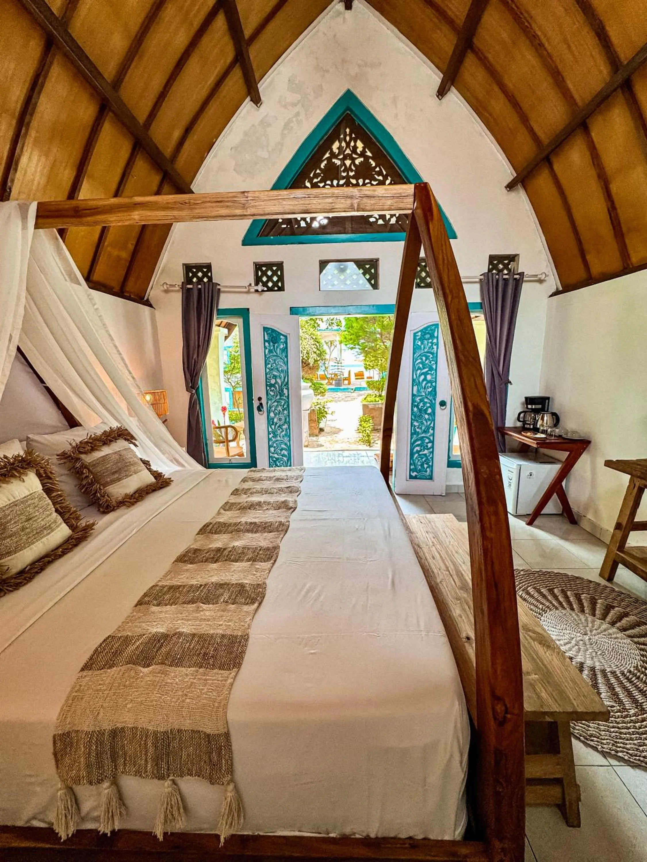 Bed in Pelangi Cottages Gili Air