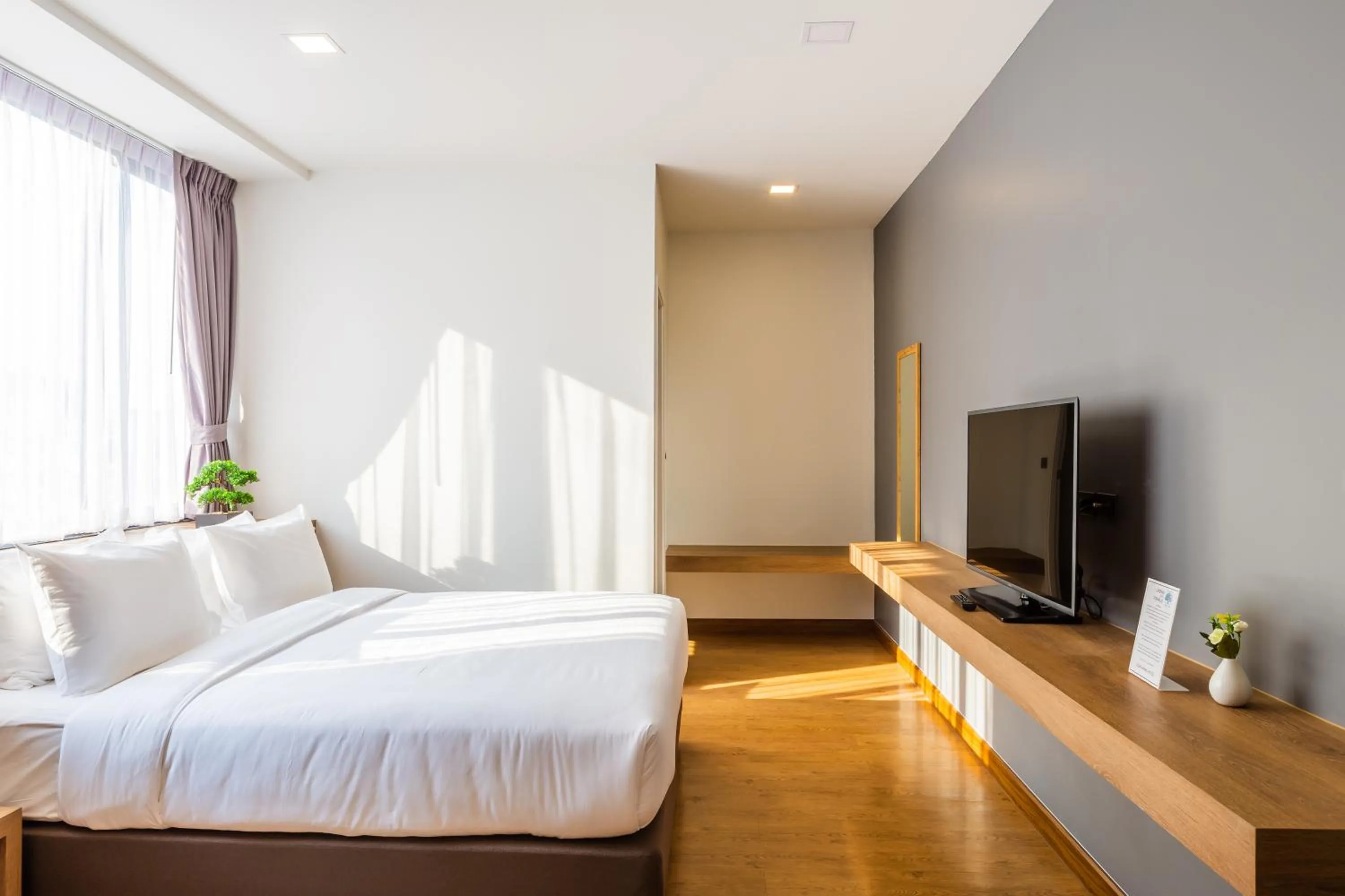 Bed in Icon Park Hotel, Chiang Mai- SHA Extra Plus