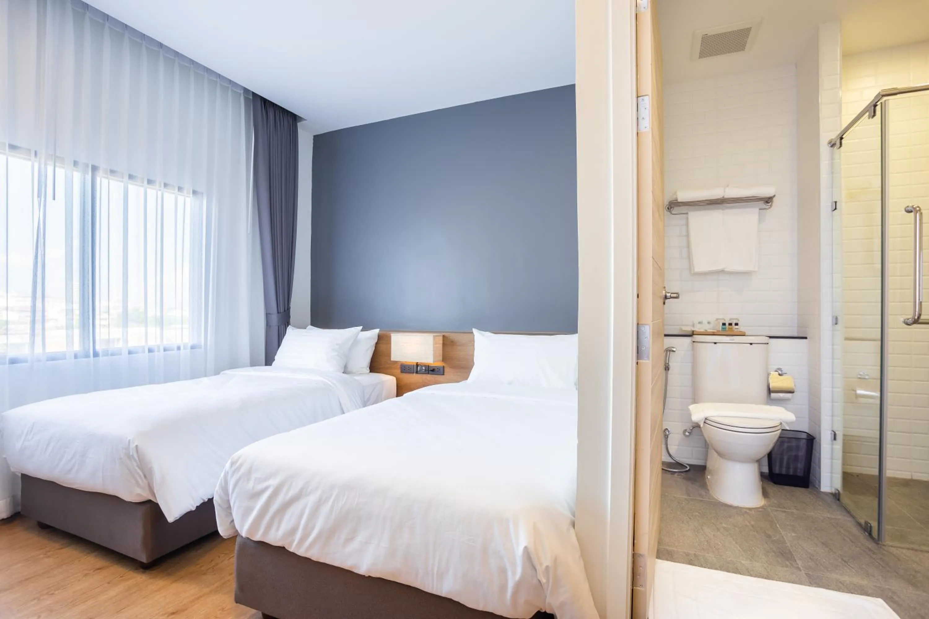 Bed in Icon Park Hotel, Chiang Mai- SHA Extra Plus