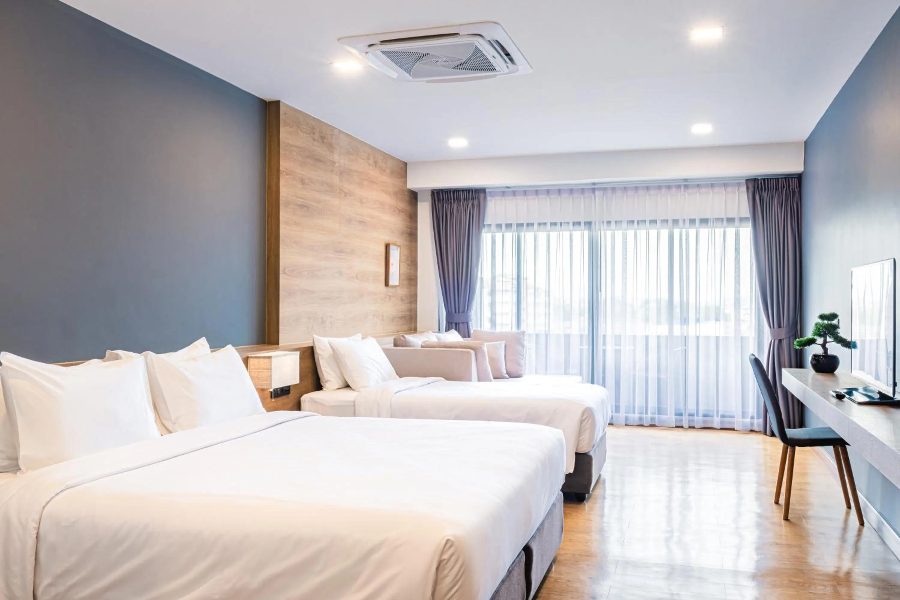 Bed in Icon Park Hotel, Chiang Mai- SHA Extra Plus