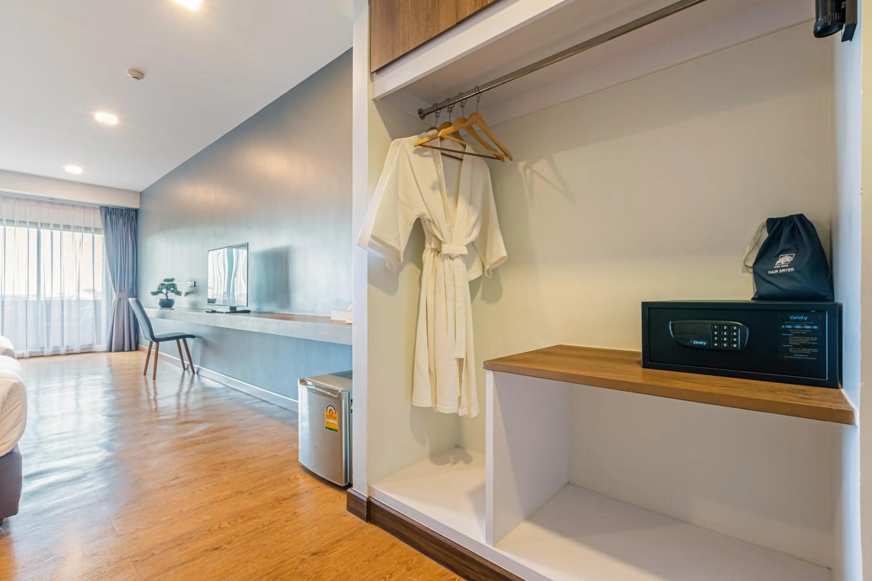 wardrobe in Icon Park Hotel, Chiang Mai- SHA Extra Plus