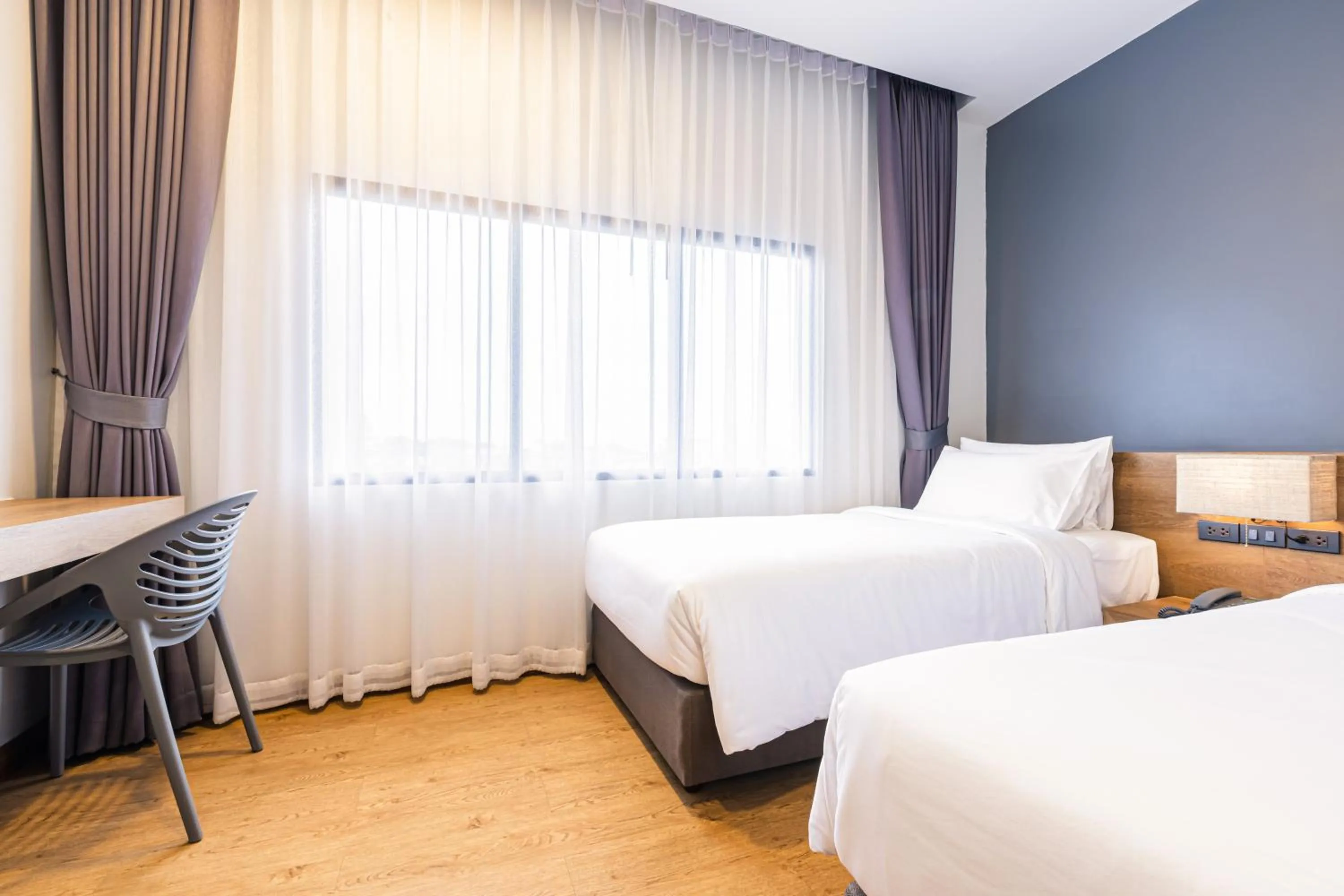 Bed in Icon Park Hotel, Chiang Mai- SHA Extra Plus