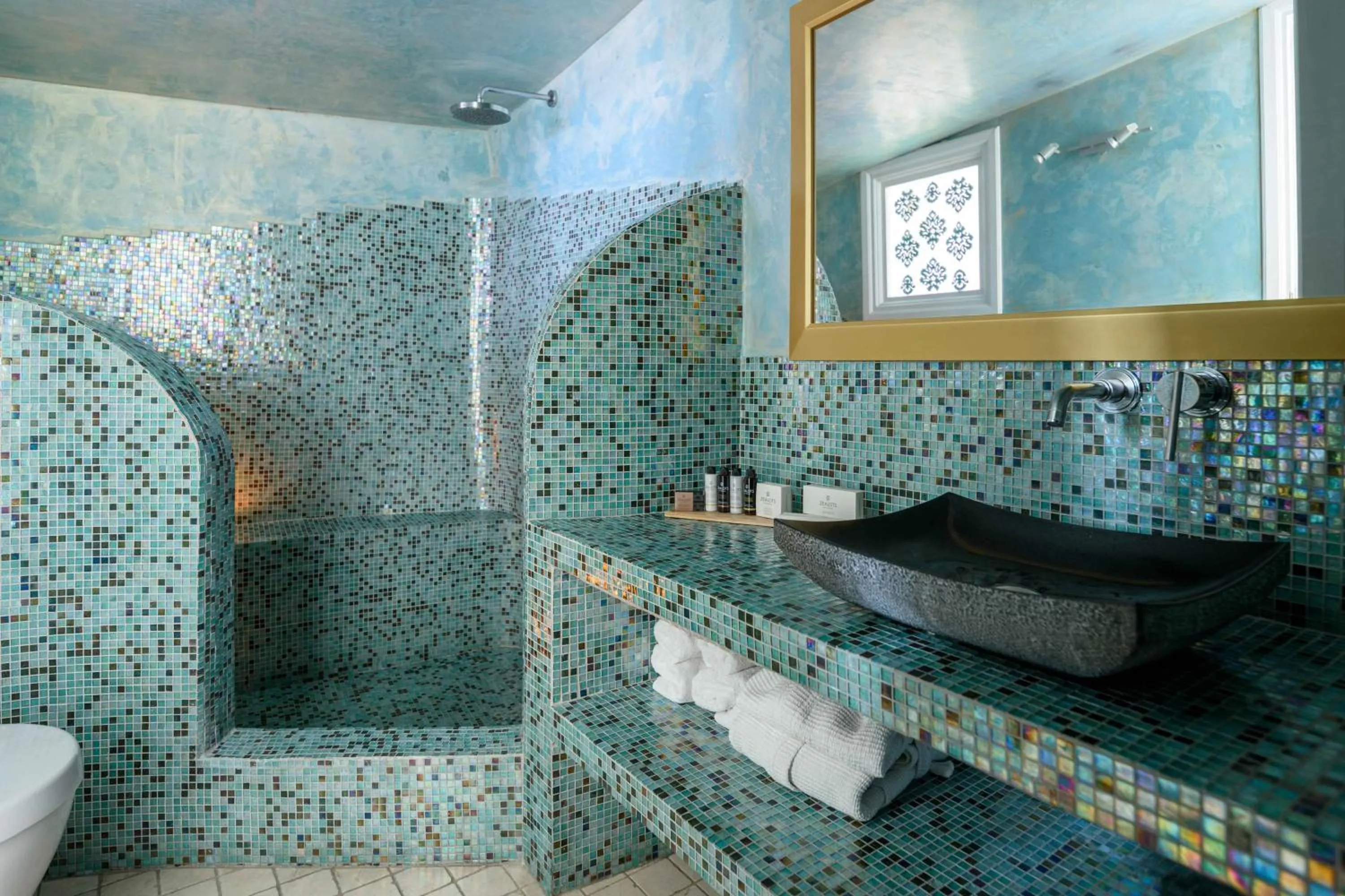 Shower in Above Blue Suites