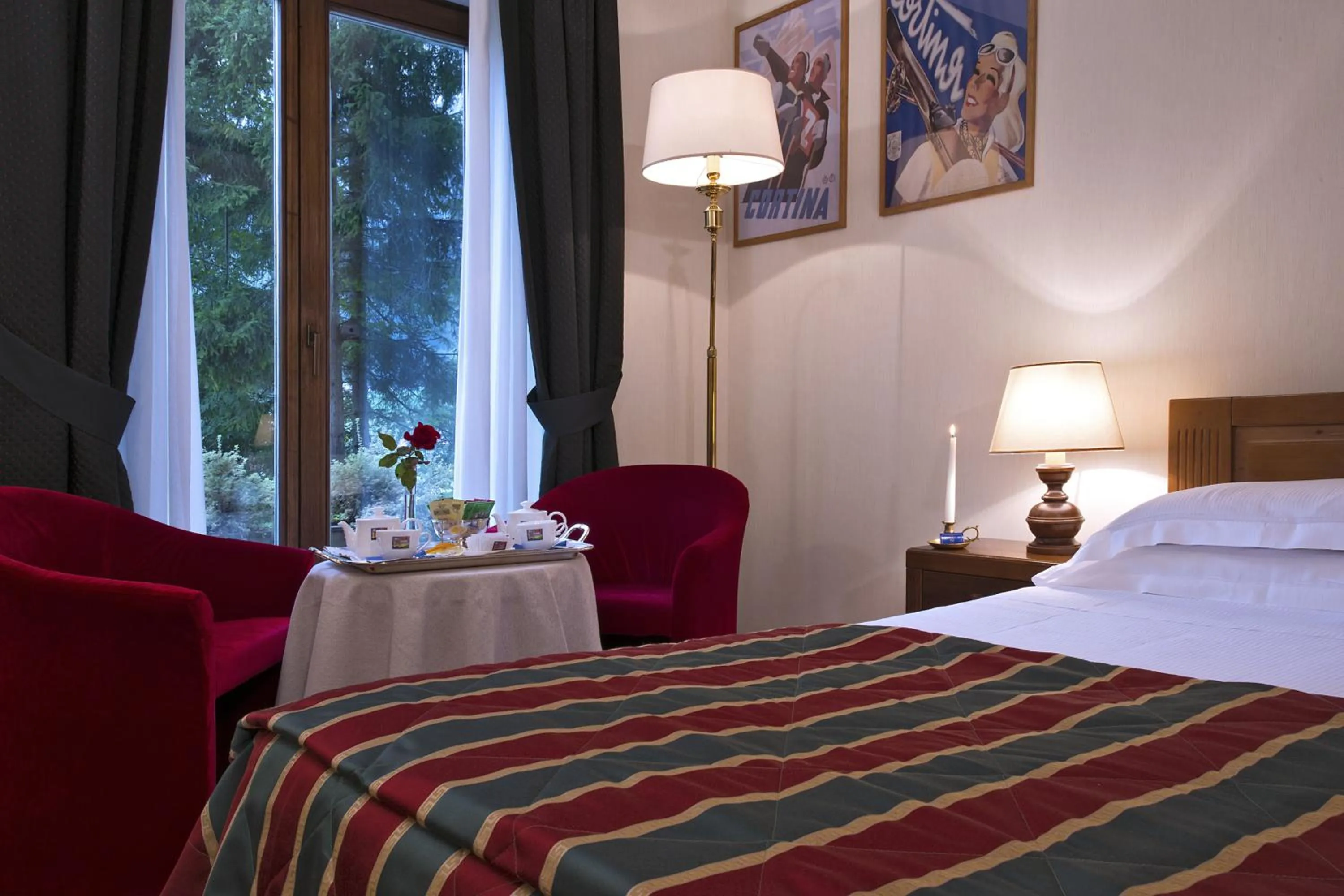 Seating area, Bed in Boutique Hotel Villa Blu Cortina D'Ampezzo