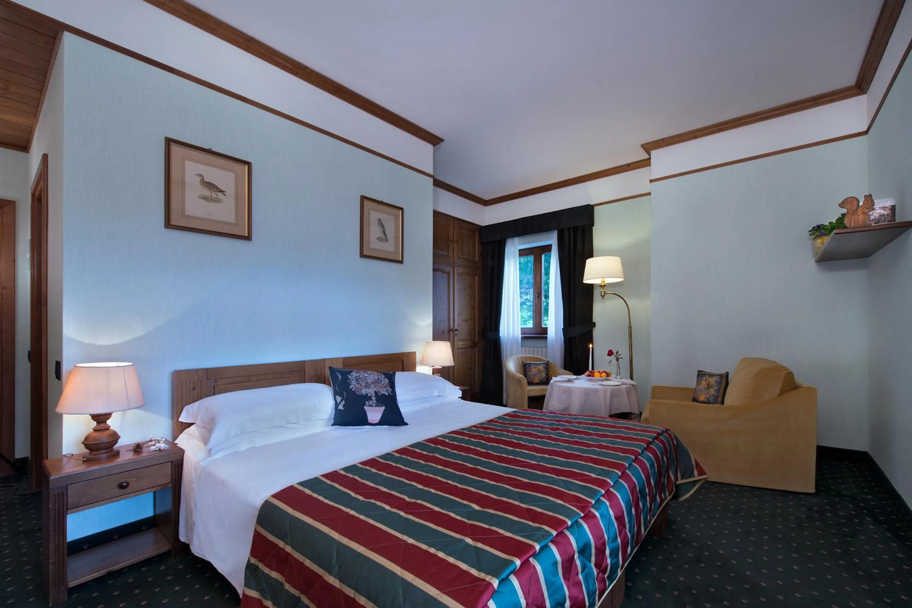 Photo of the whole room, Bed in Boutique Hotel Villa Blu Cortina D'Ampezzo